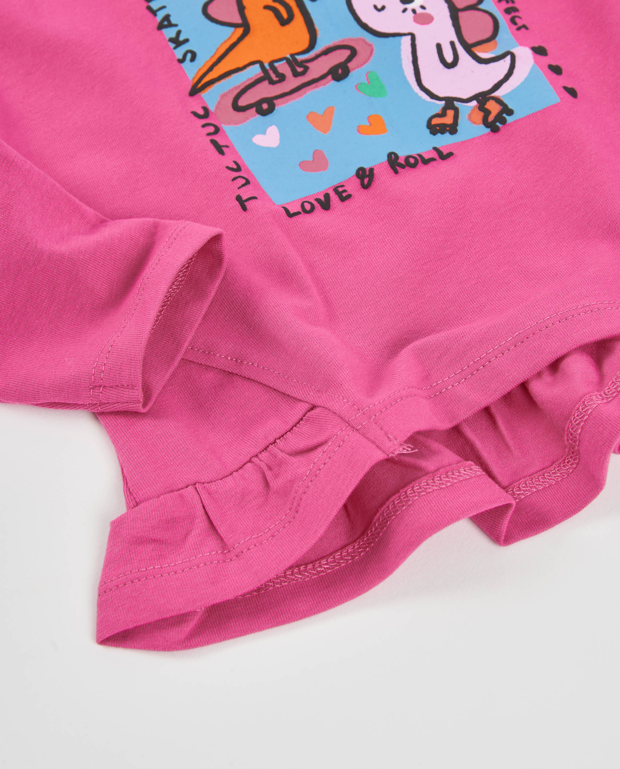Camiseta de niña de punto con volantes y estampado ilustrado