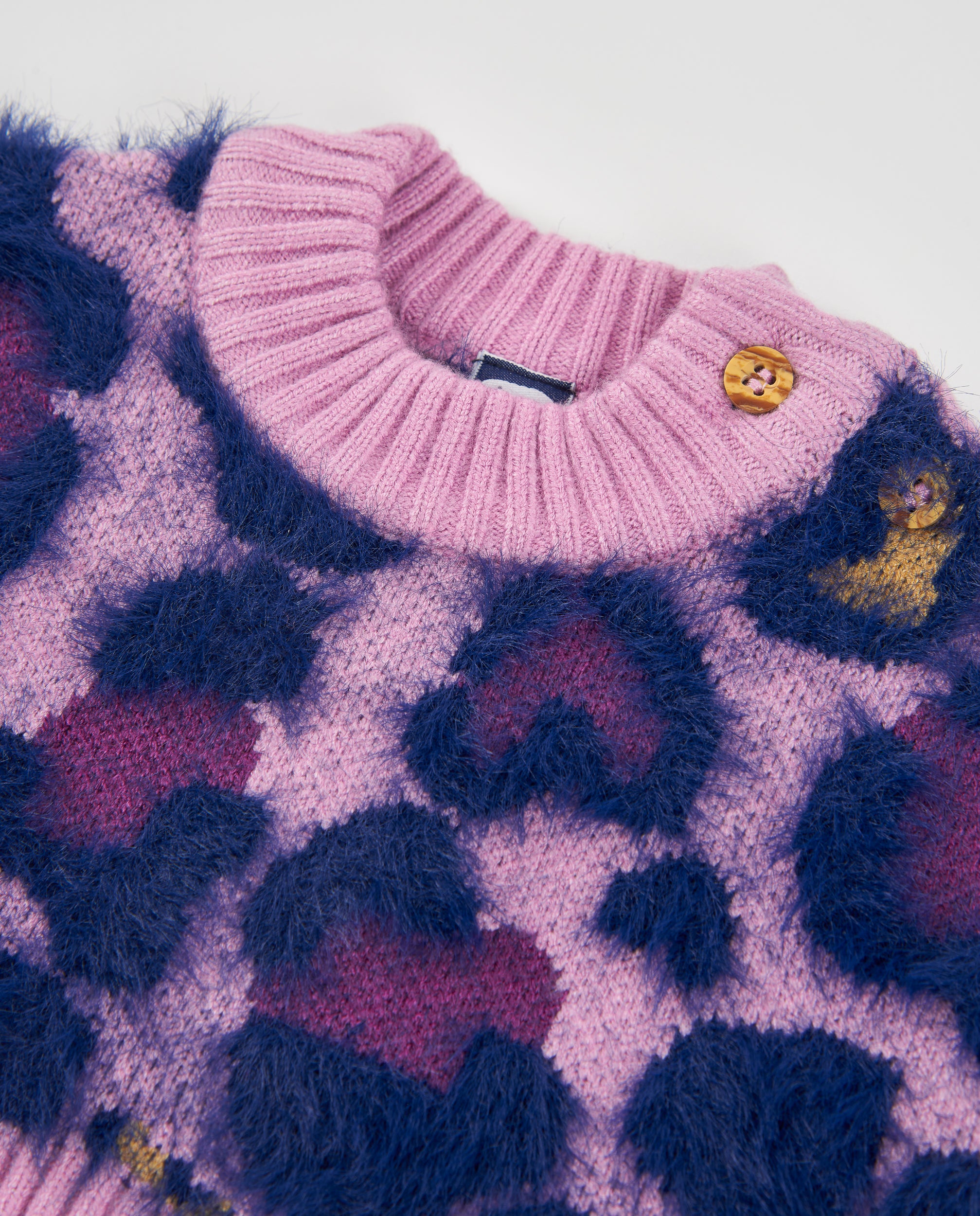 Jersey de niña de tricot con estampado animal print y tejido cálido