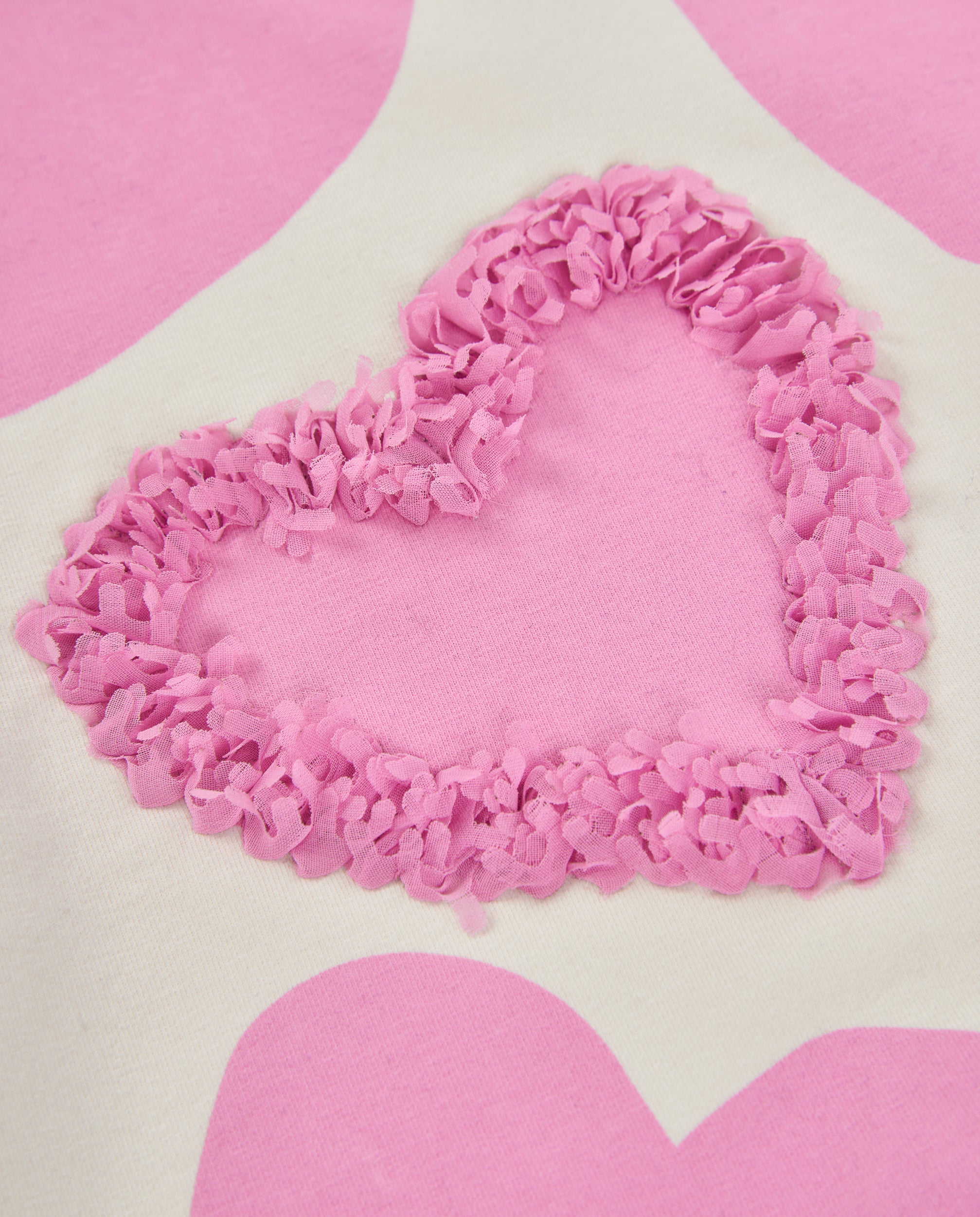 Sudadera de niña de felpa con diseño de corazones con texturas