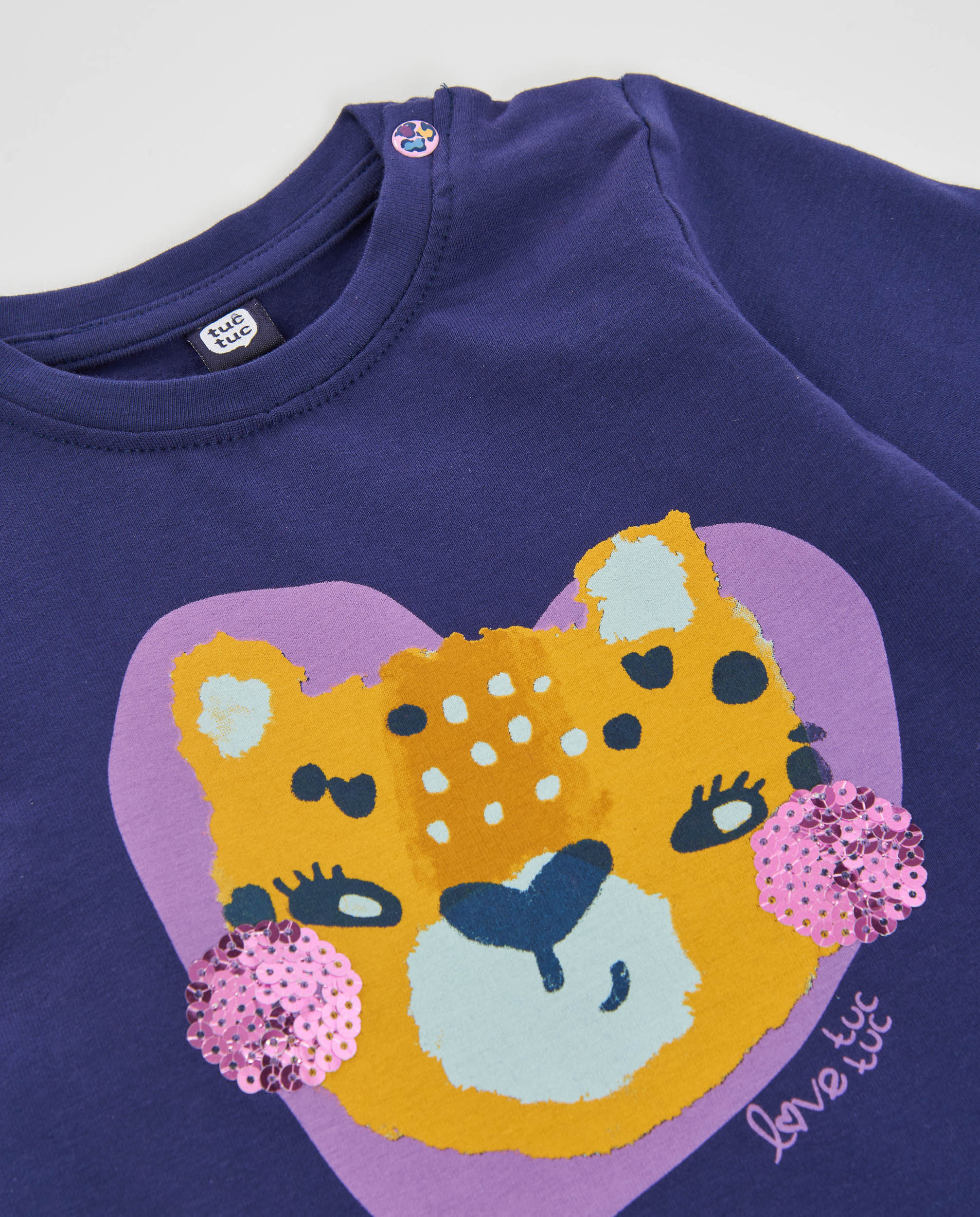 Camiseta de niña de punto con apliques animados y manga larga