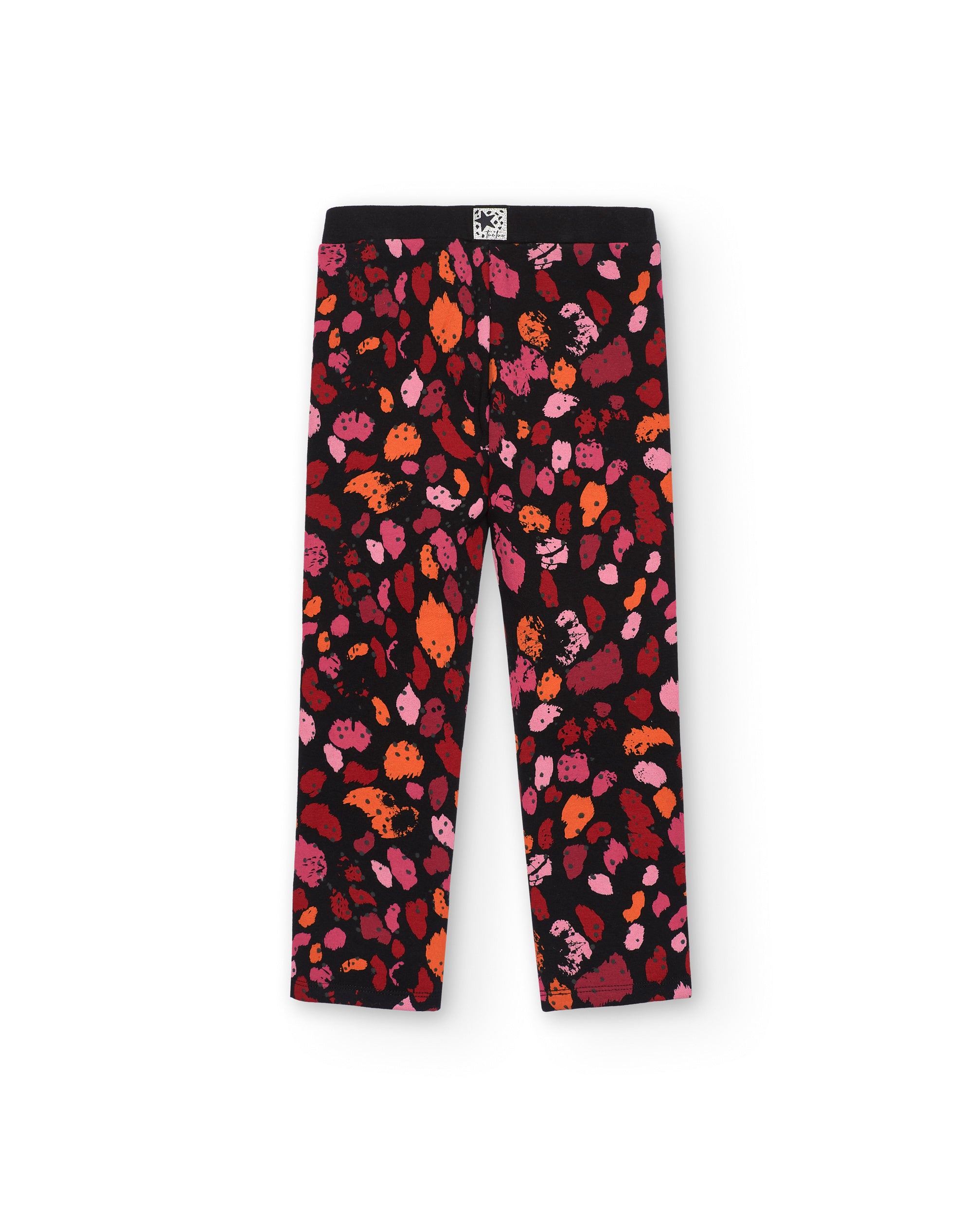 Leggings negros con estampado de manchas en tonos rojos y rosas