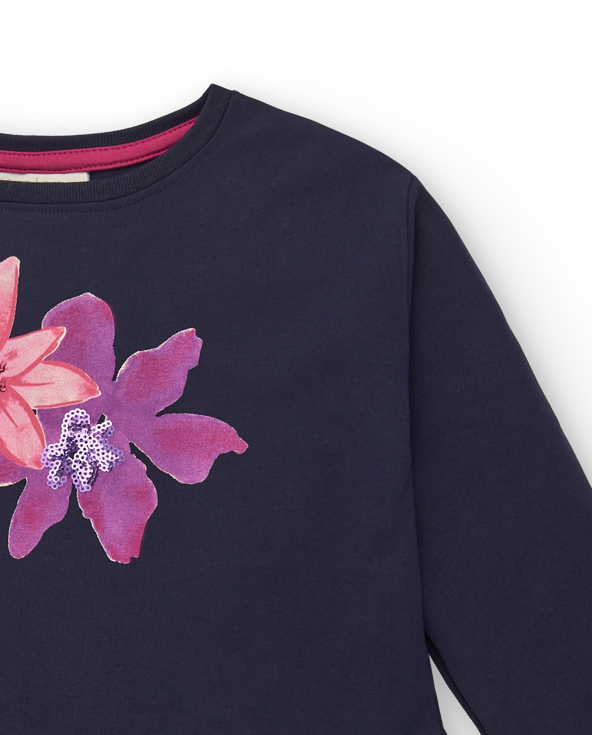 Camiseta azul marino con detalles florales para niña colección