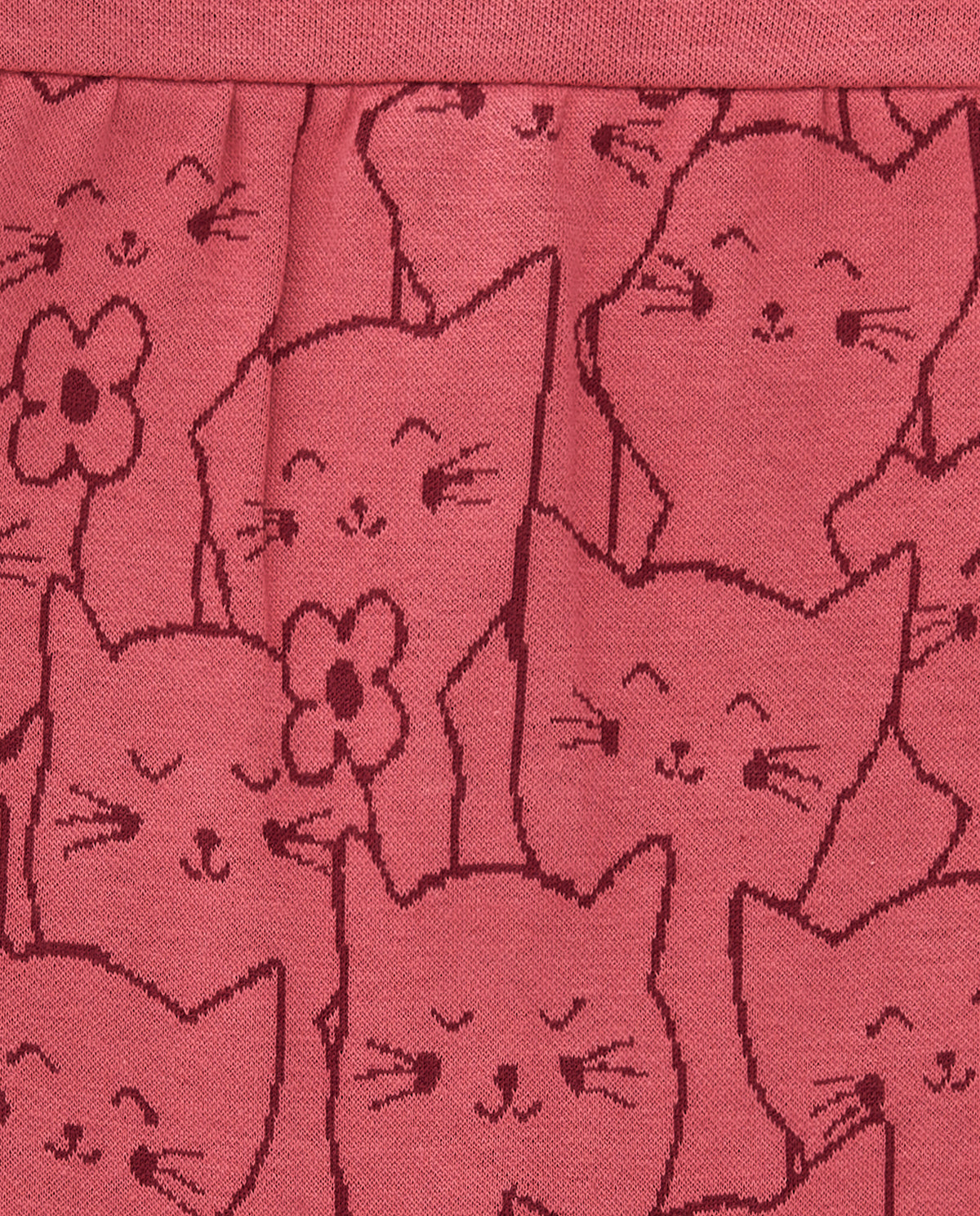 Pelele para niña en color rosa con estampado de gatitos