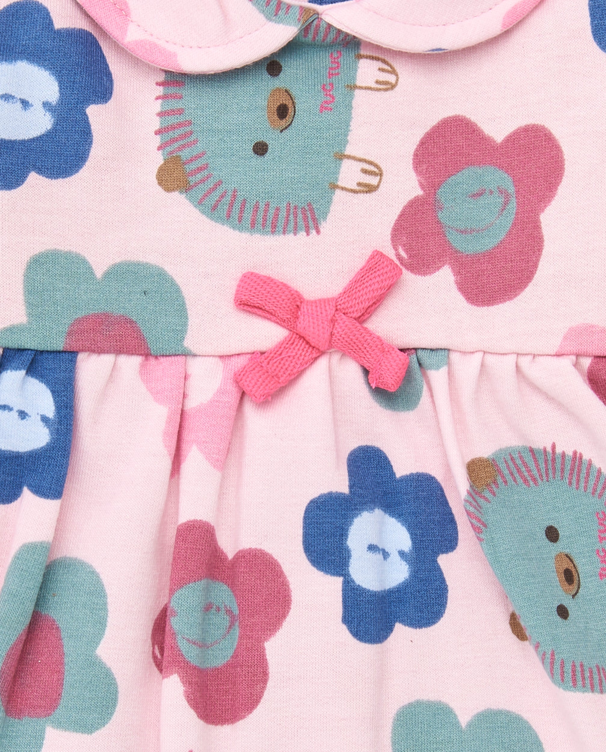 Vestido para niña en rosa con estampado floral y erizos