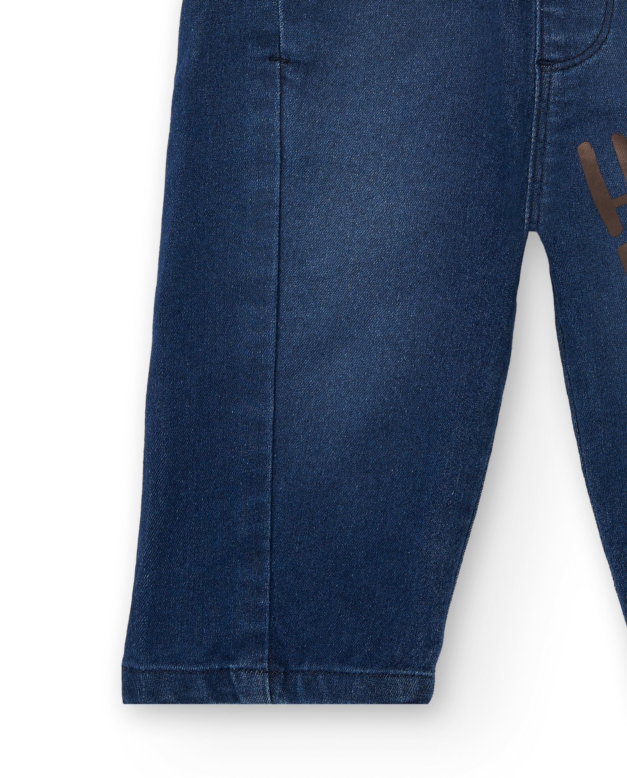 Pantalón vaquero jogger para niño en azul con estampado de rayo