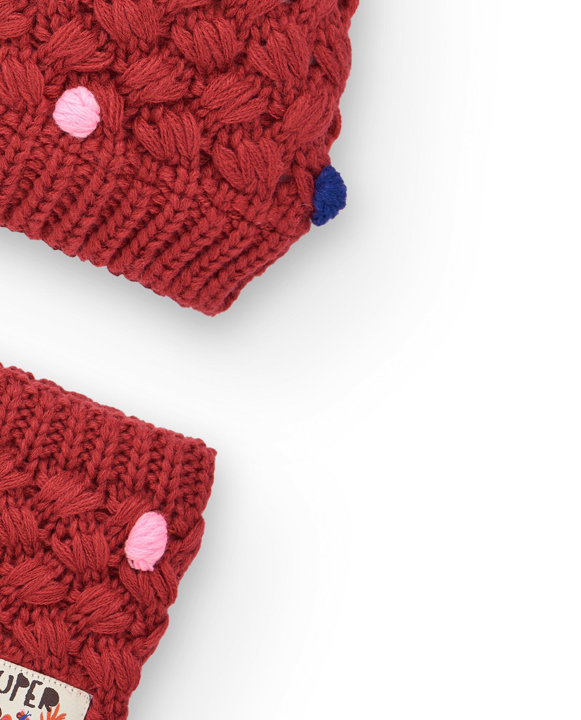 Conjunto de gorro y braga para niña en rojo con pompones