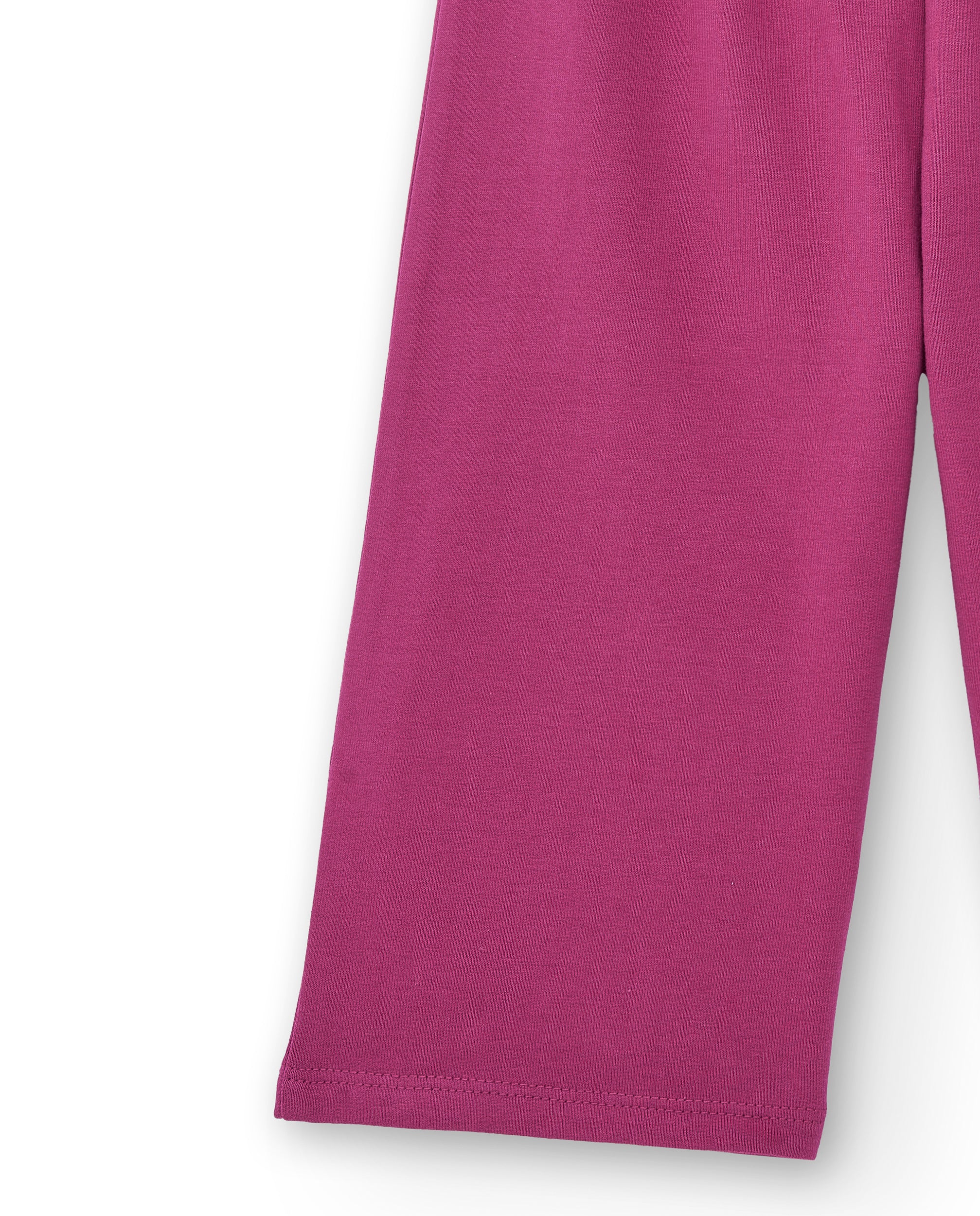 Pantalón de felpa para niña en color fucsia con lazo colección