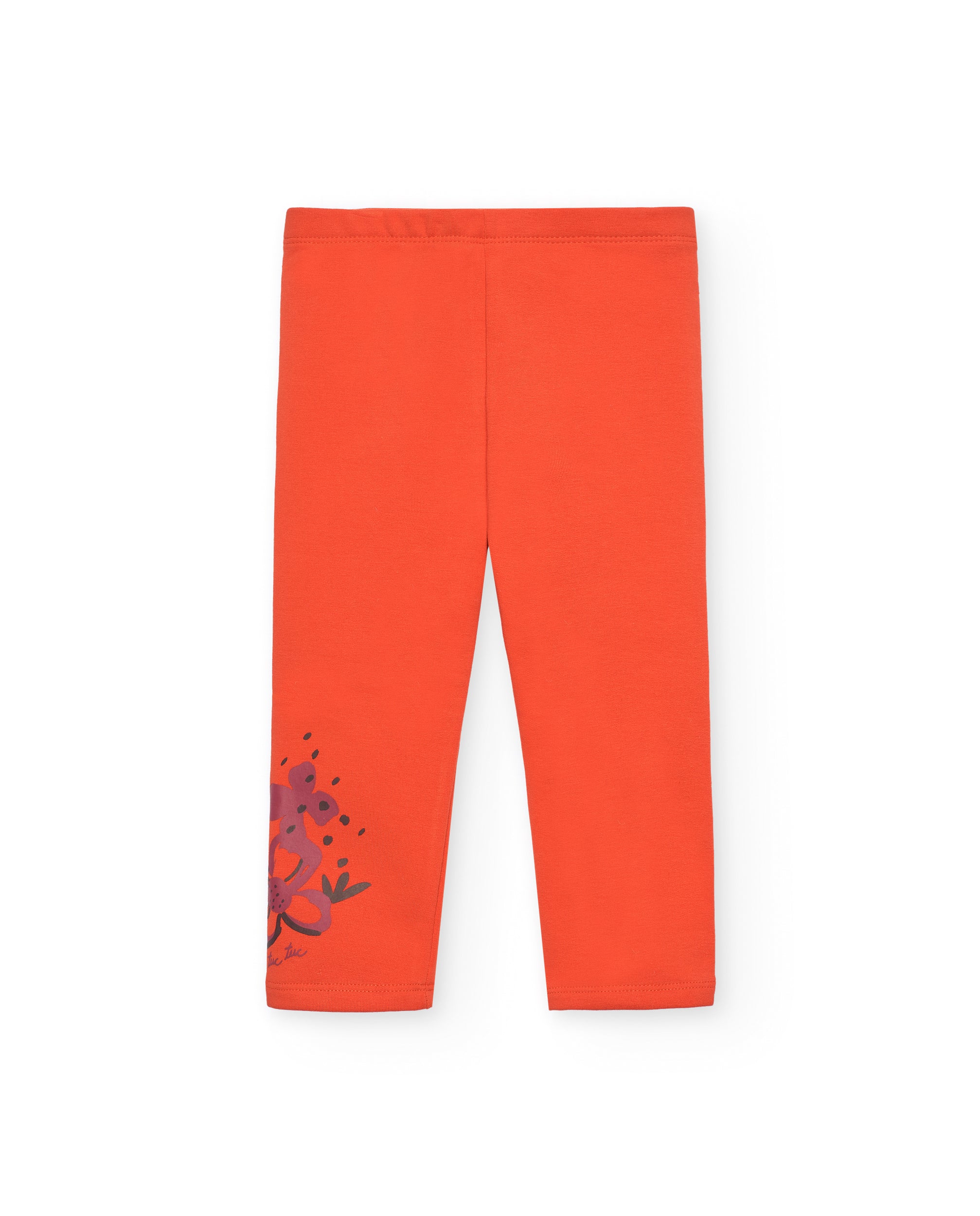 Leggings para niña en naranja con detalle floral colección