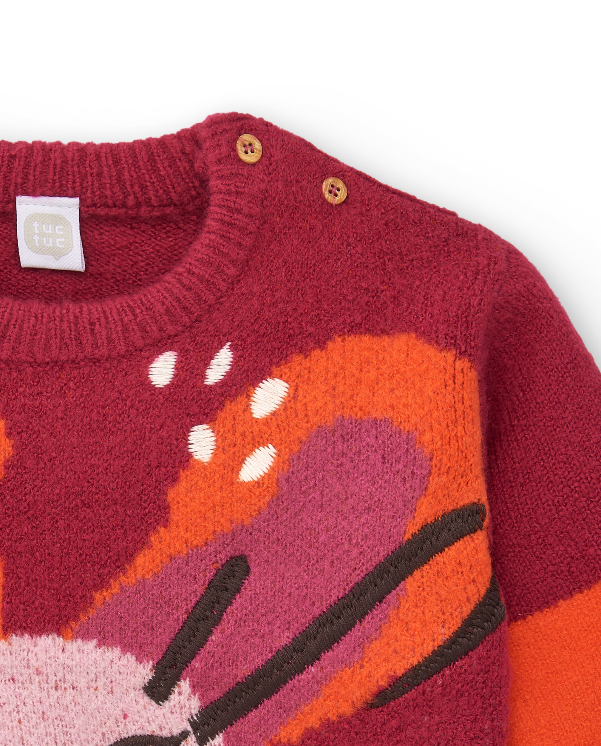 Suéter de niña en rojo con diseño de cara sonriente colección