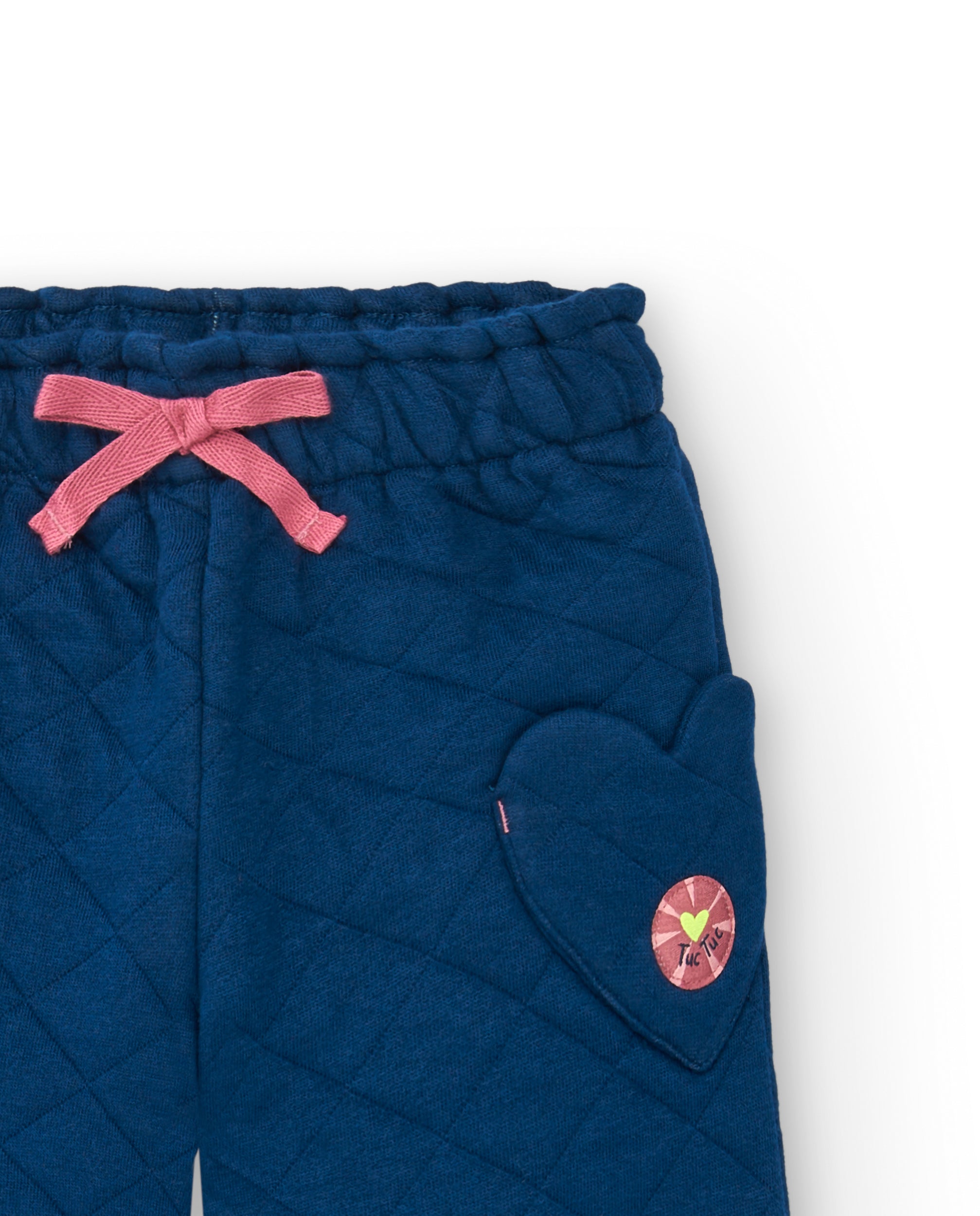 Pantalón acolchado azul con bolsillos en forma de corazón para