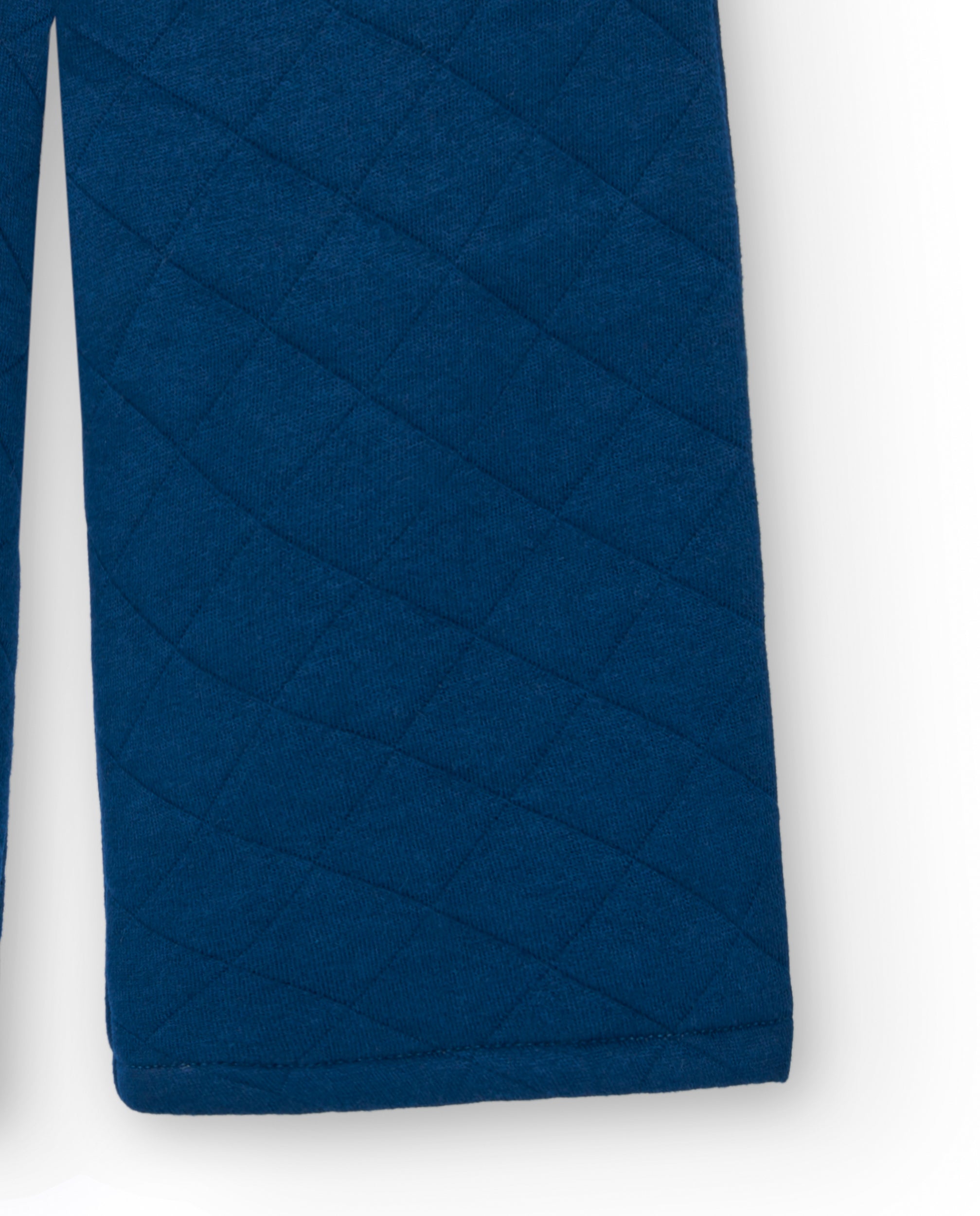 Pantalón acolchado azul con bolsillos en forma de corazón para