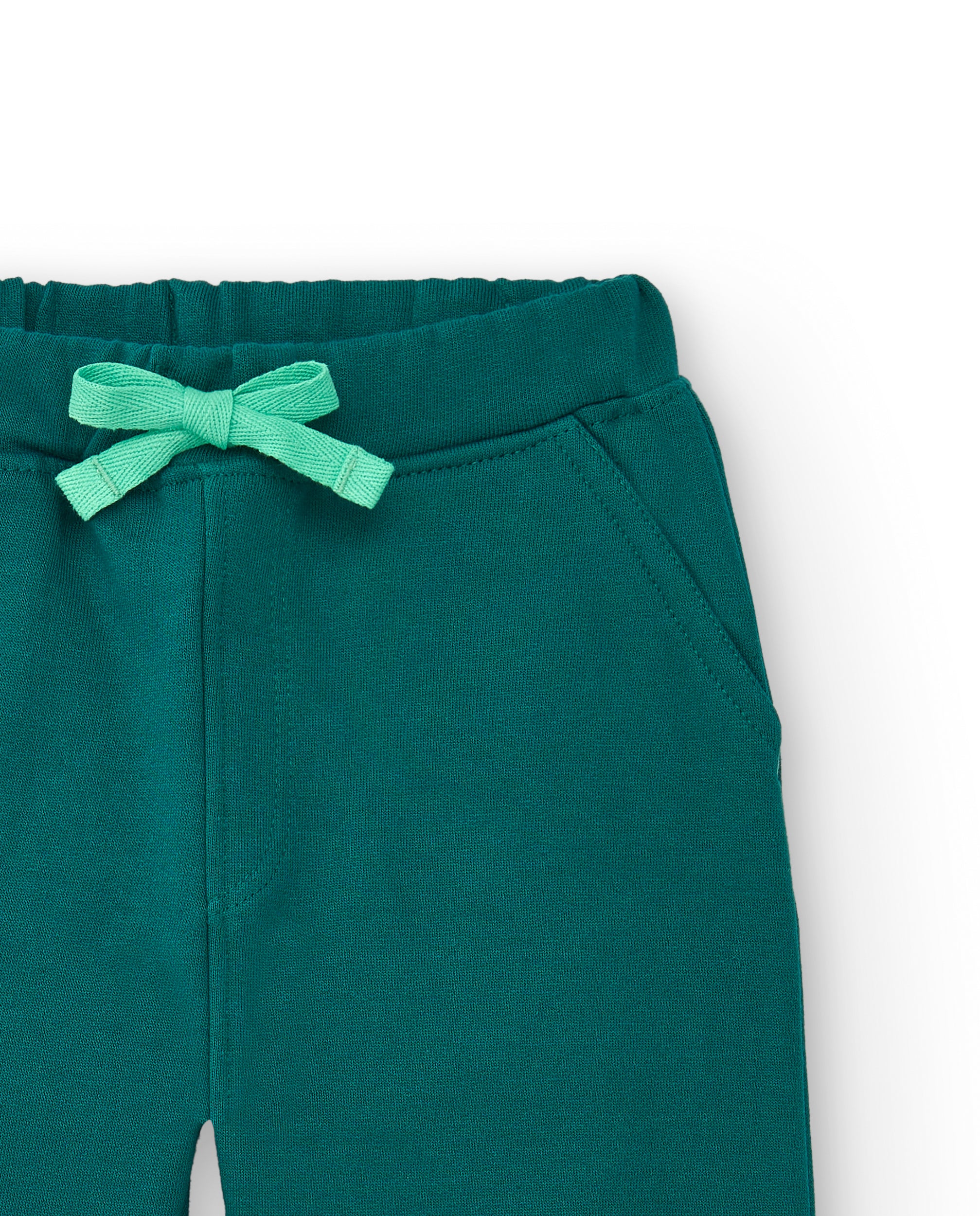 Pantalones jogger para niño en verde con bolsillo lateral