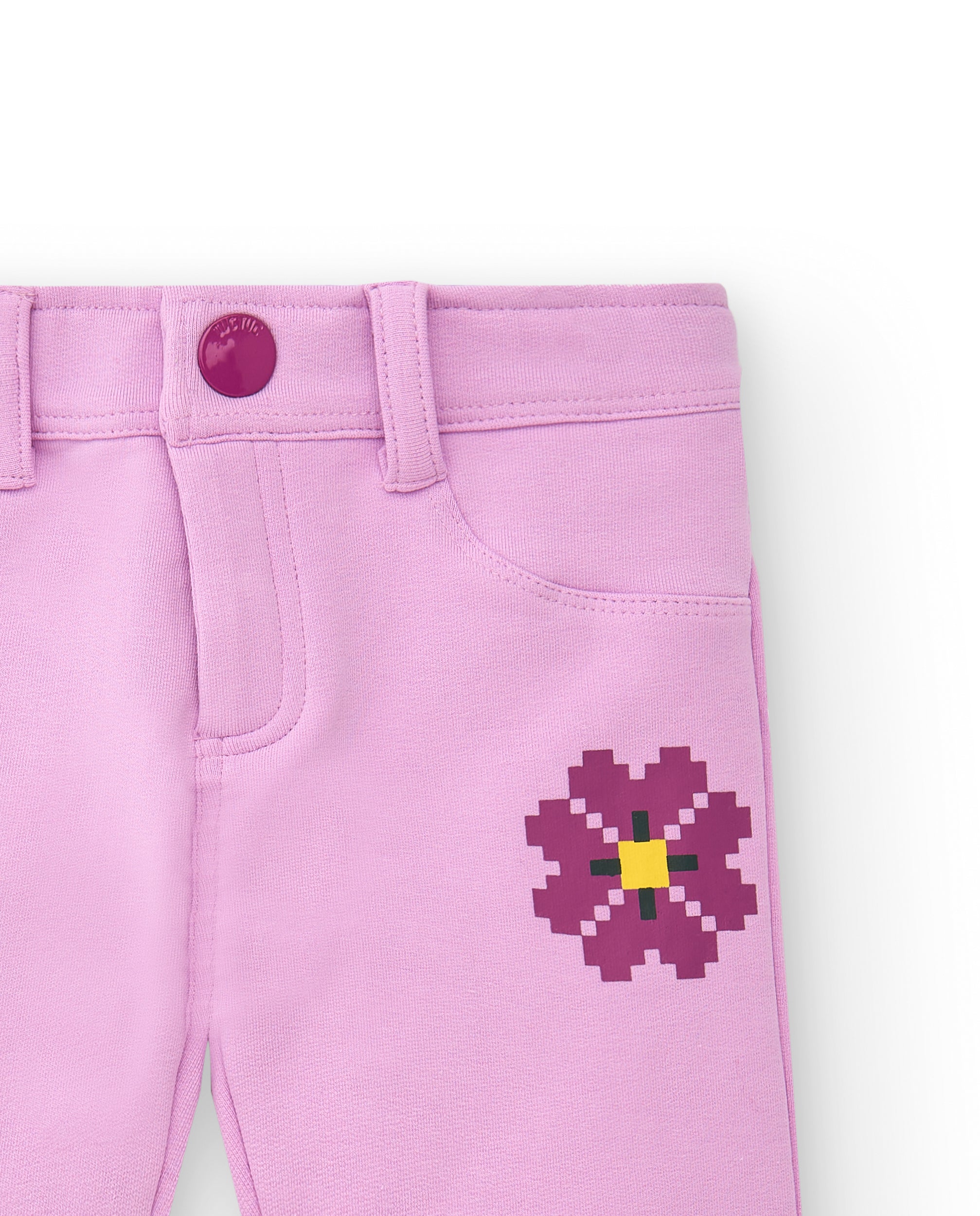 Pantalones para niña en color rosa con detalles de flores