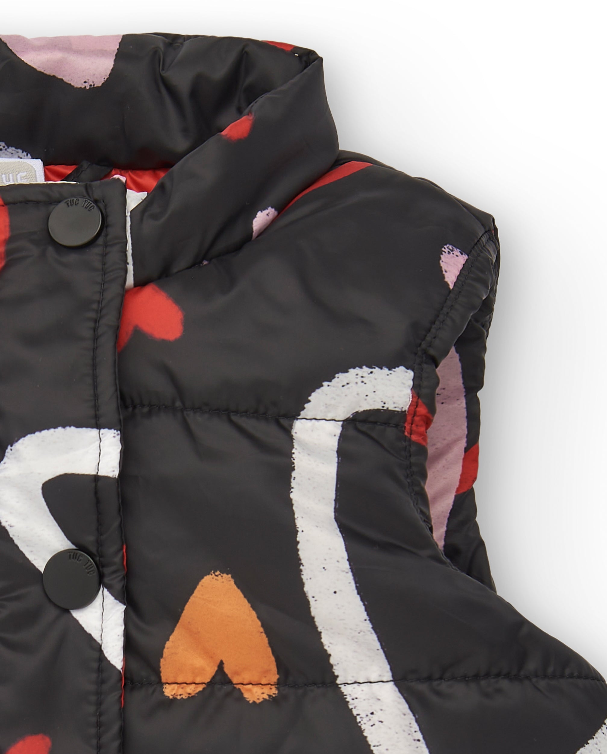 Chaleco niña en negro con estampado de corazones colección