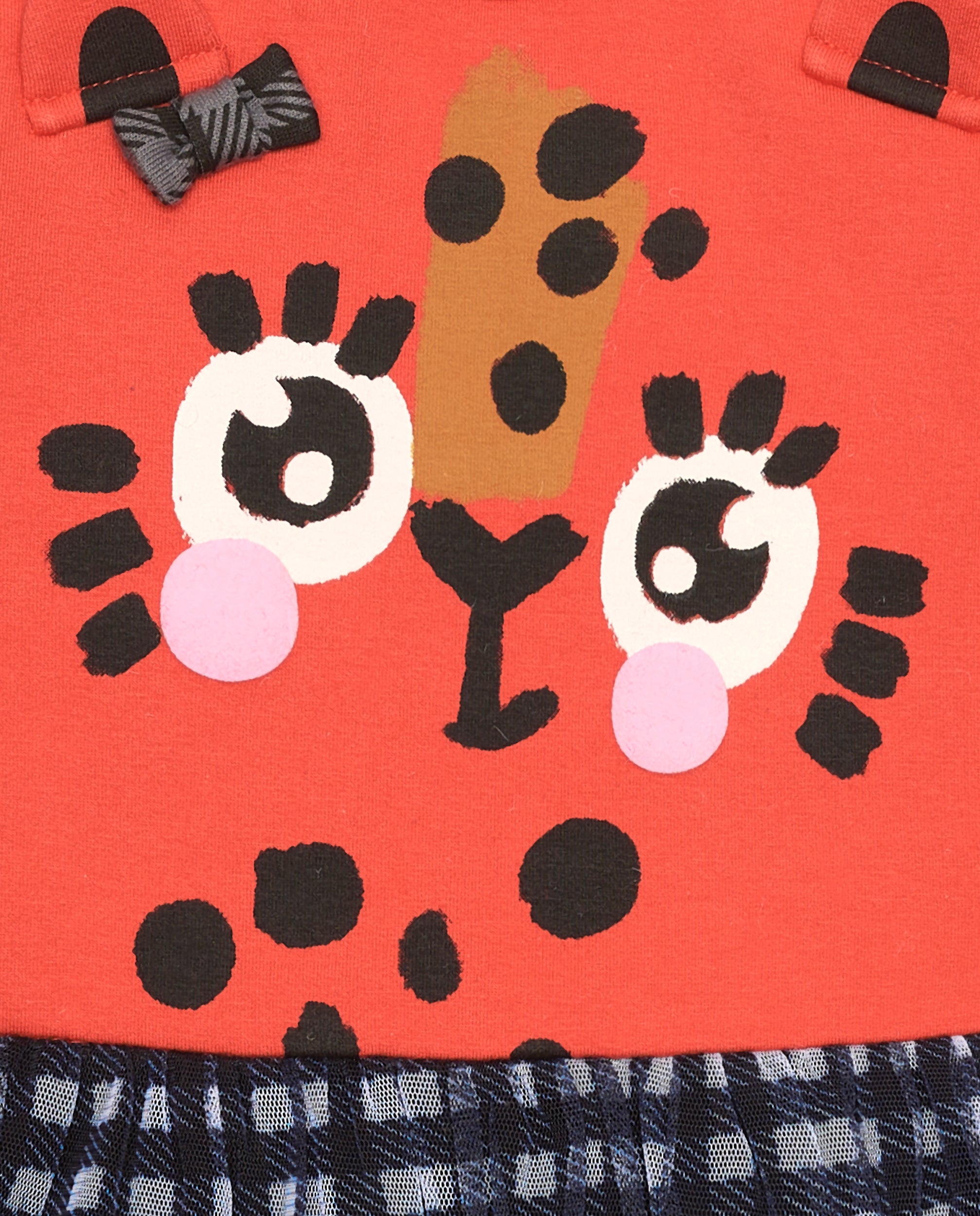Vestido rojo con diseño de leopardo y falda de cuadros para