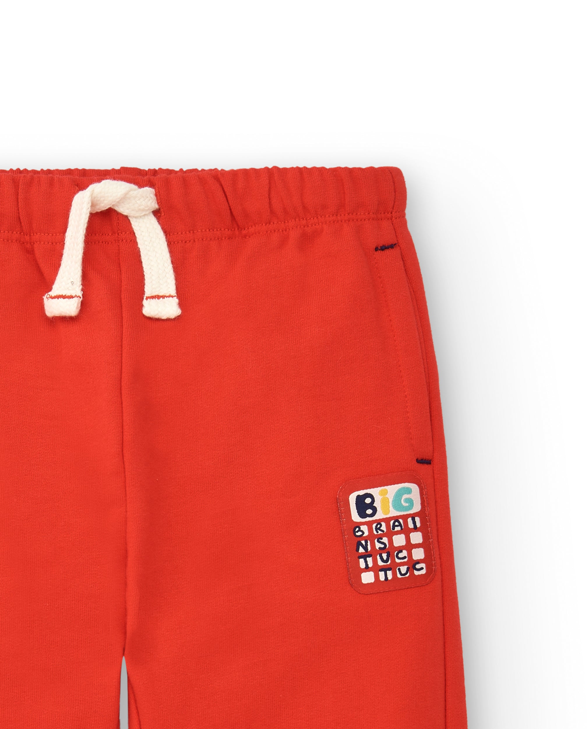Pantalón jogger niño en rojo con detalle de calculadora