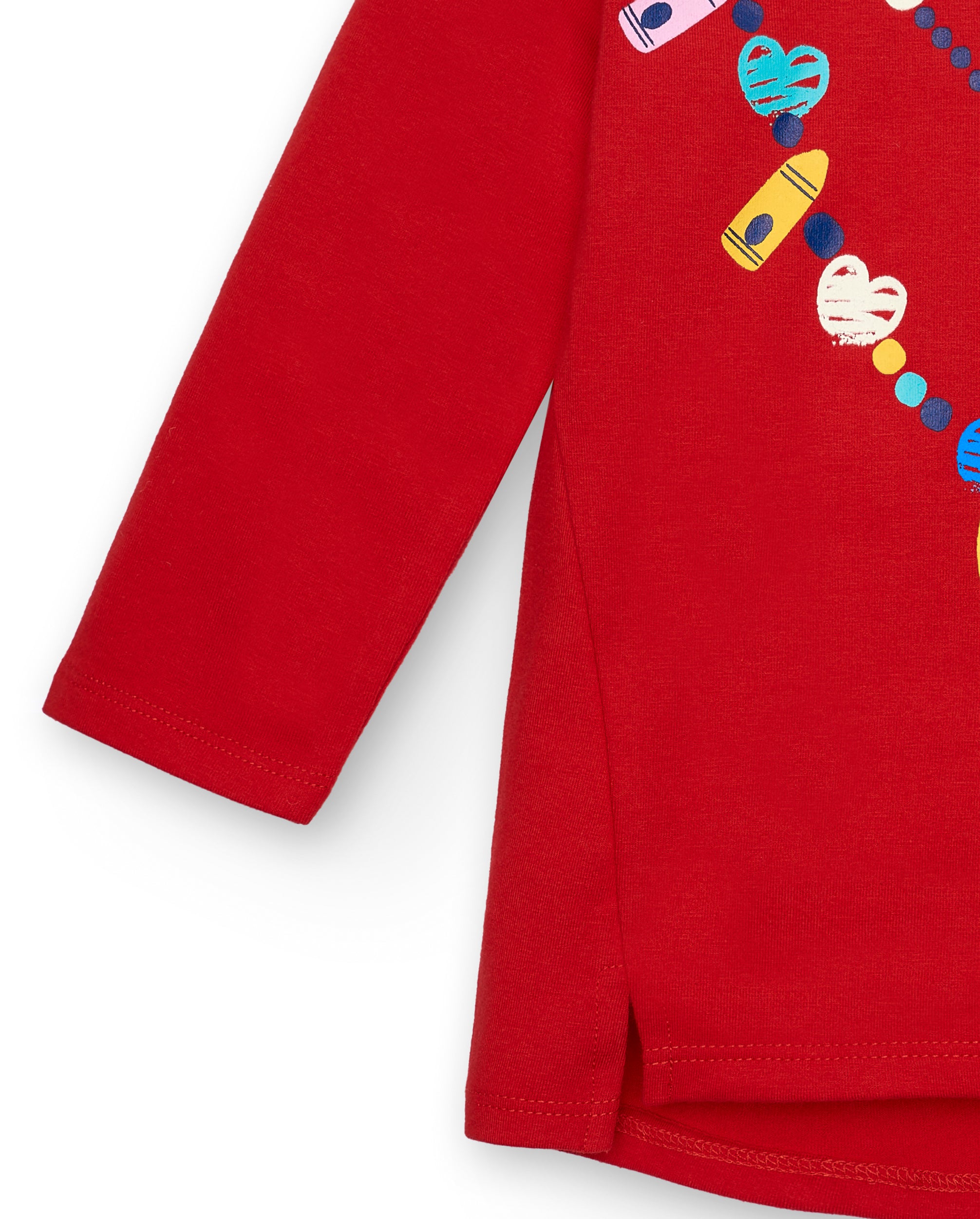 Camiseta niña en rojo con estampado creativo y detalle de