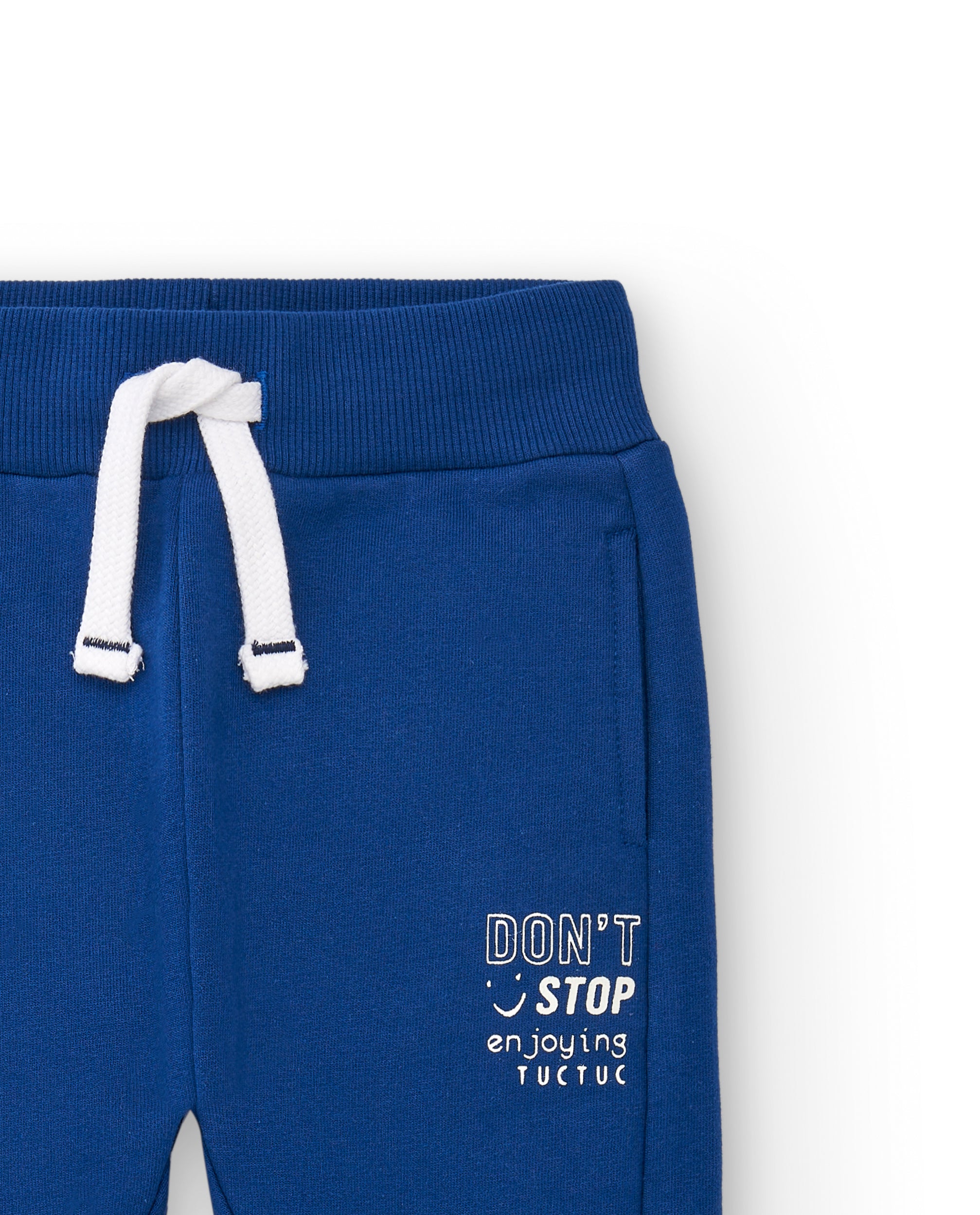 Pantalón felpa niño en azul con cordón ajustable colección
