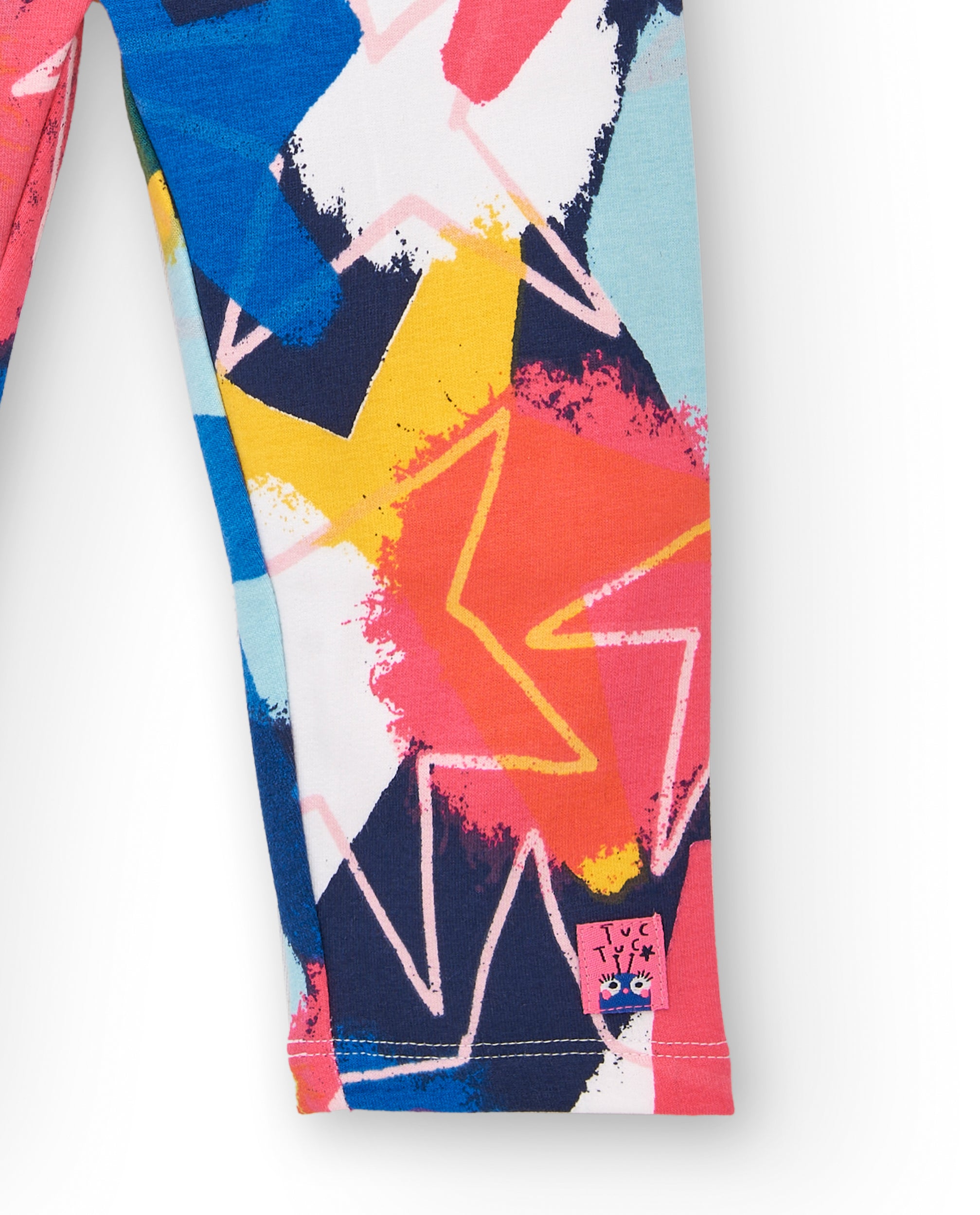 Leggings niña en azul y fucsia con estampado de estrellas