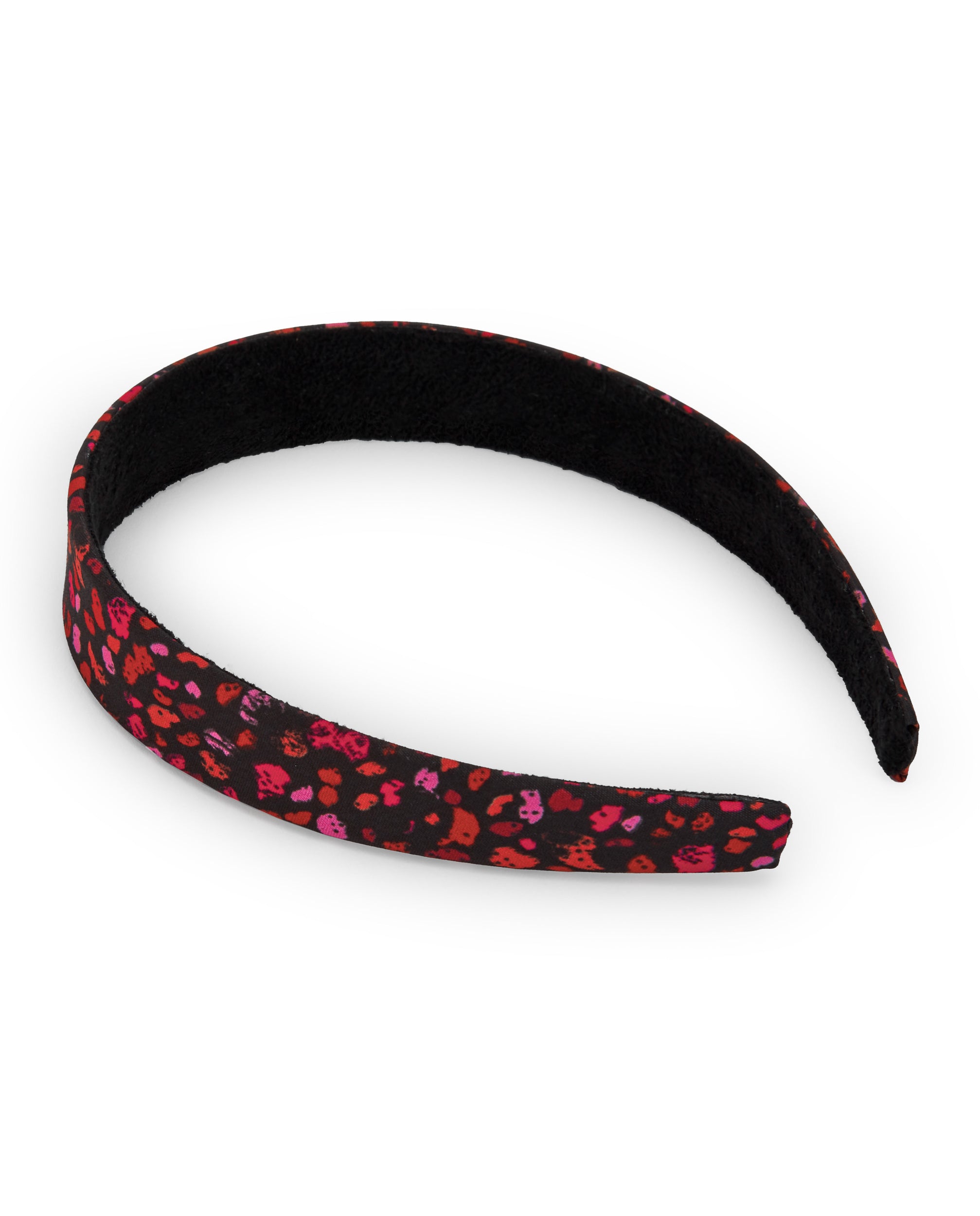 Diadema negra con estampado animal print en tonos rosas y rojos