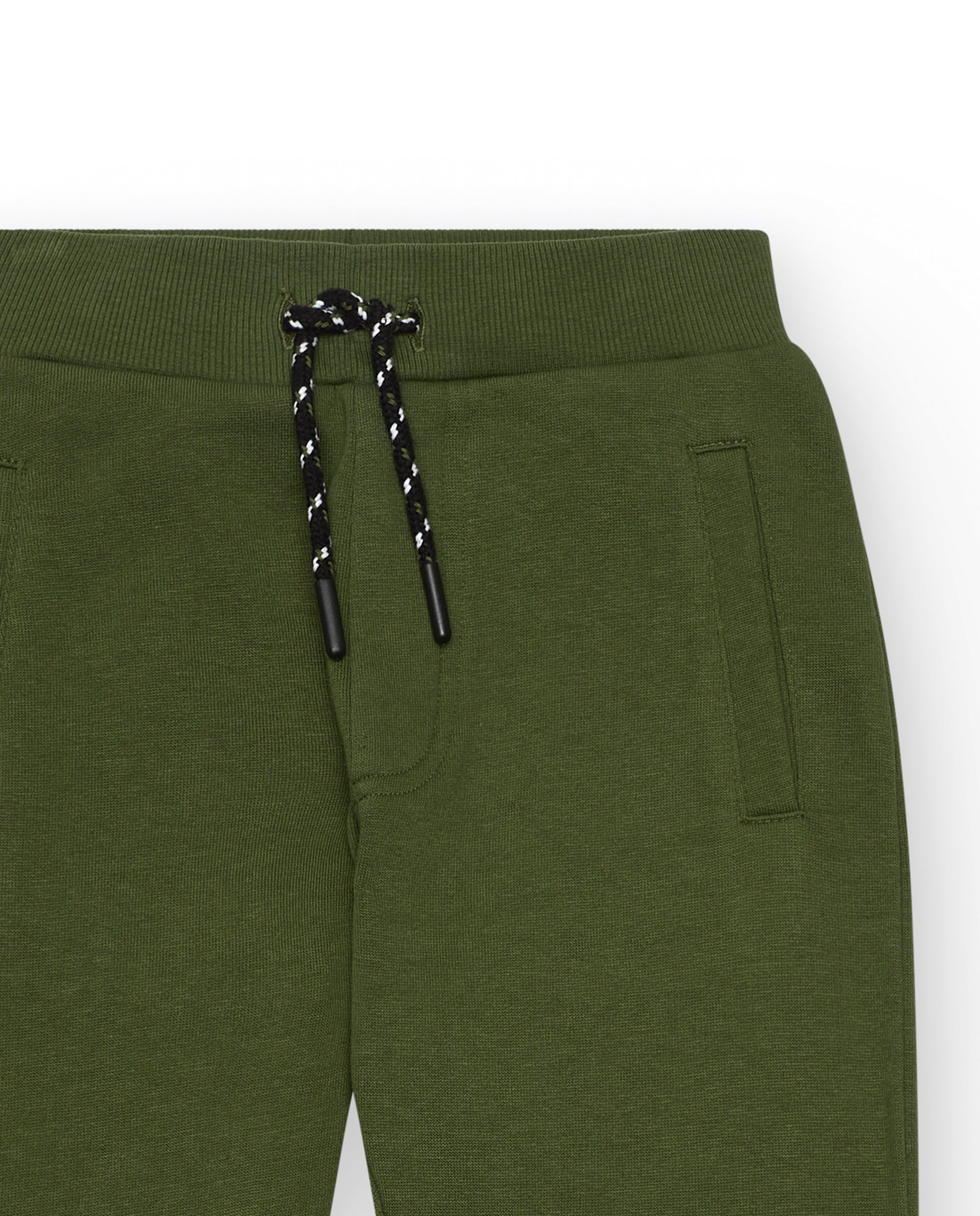 Pantalón verde con estampado gráfico para niño de la colección