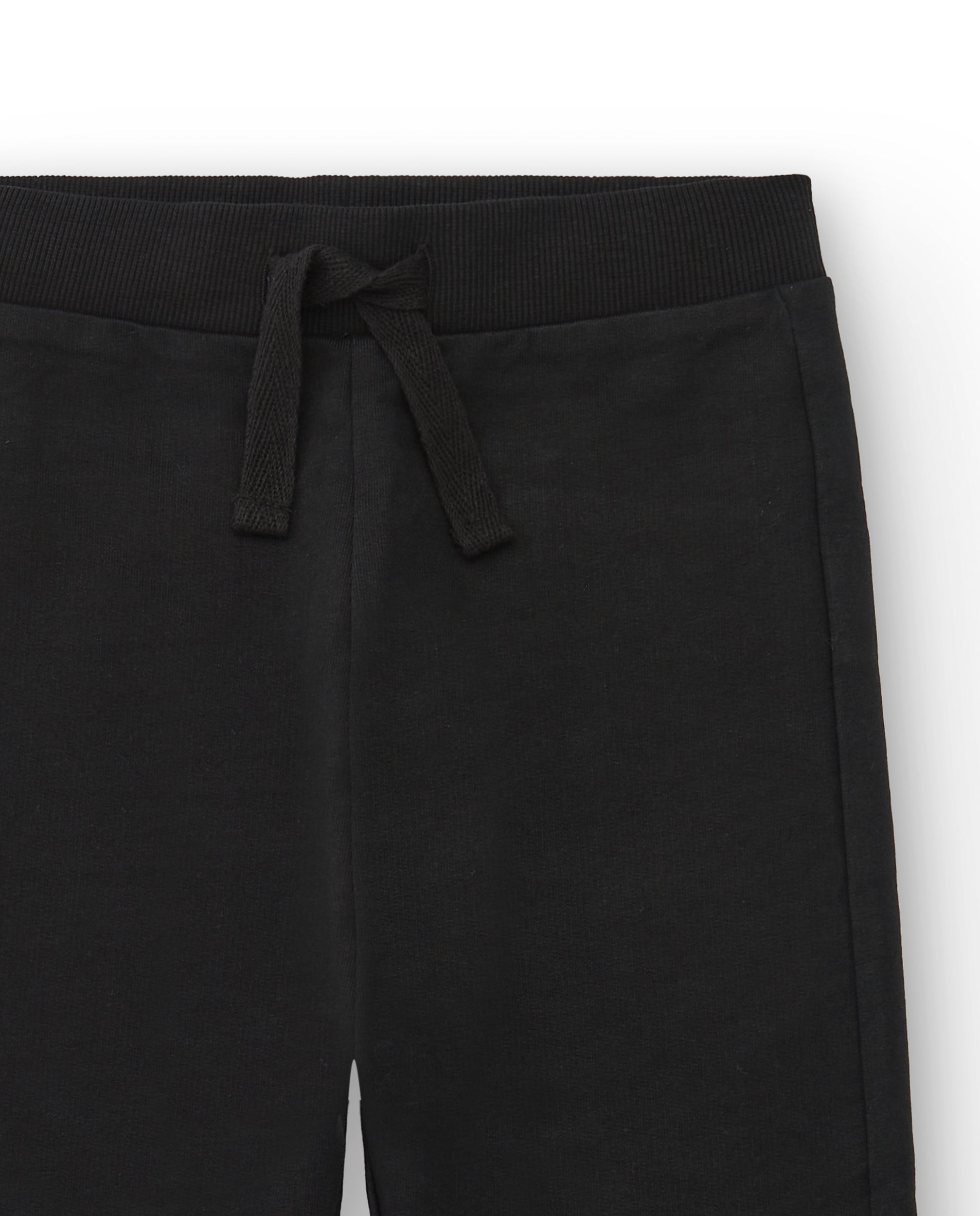 Pantalón jogger niño en negro con cordón ajustable colección