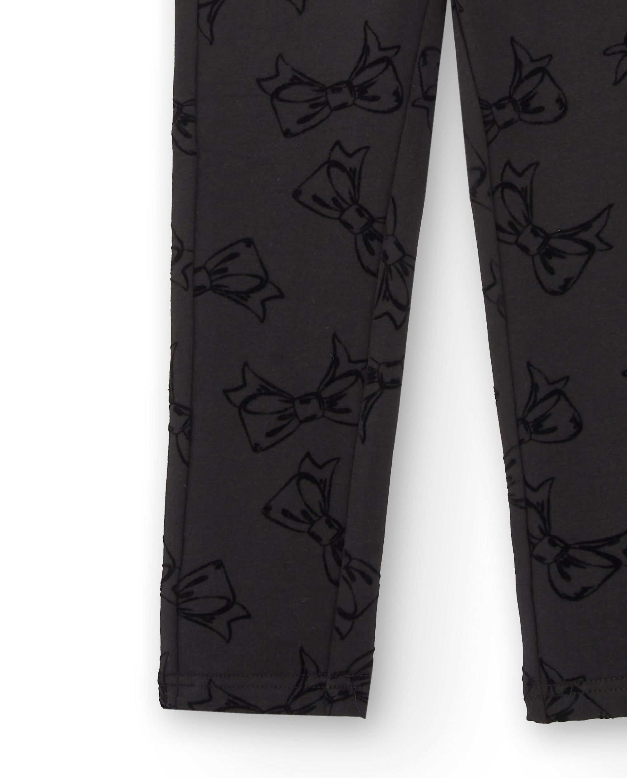 Leggings negros con estampado de lazos para niña colección