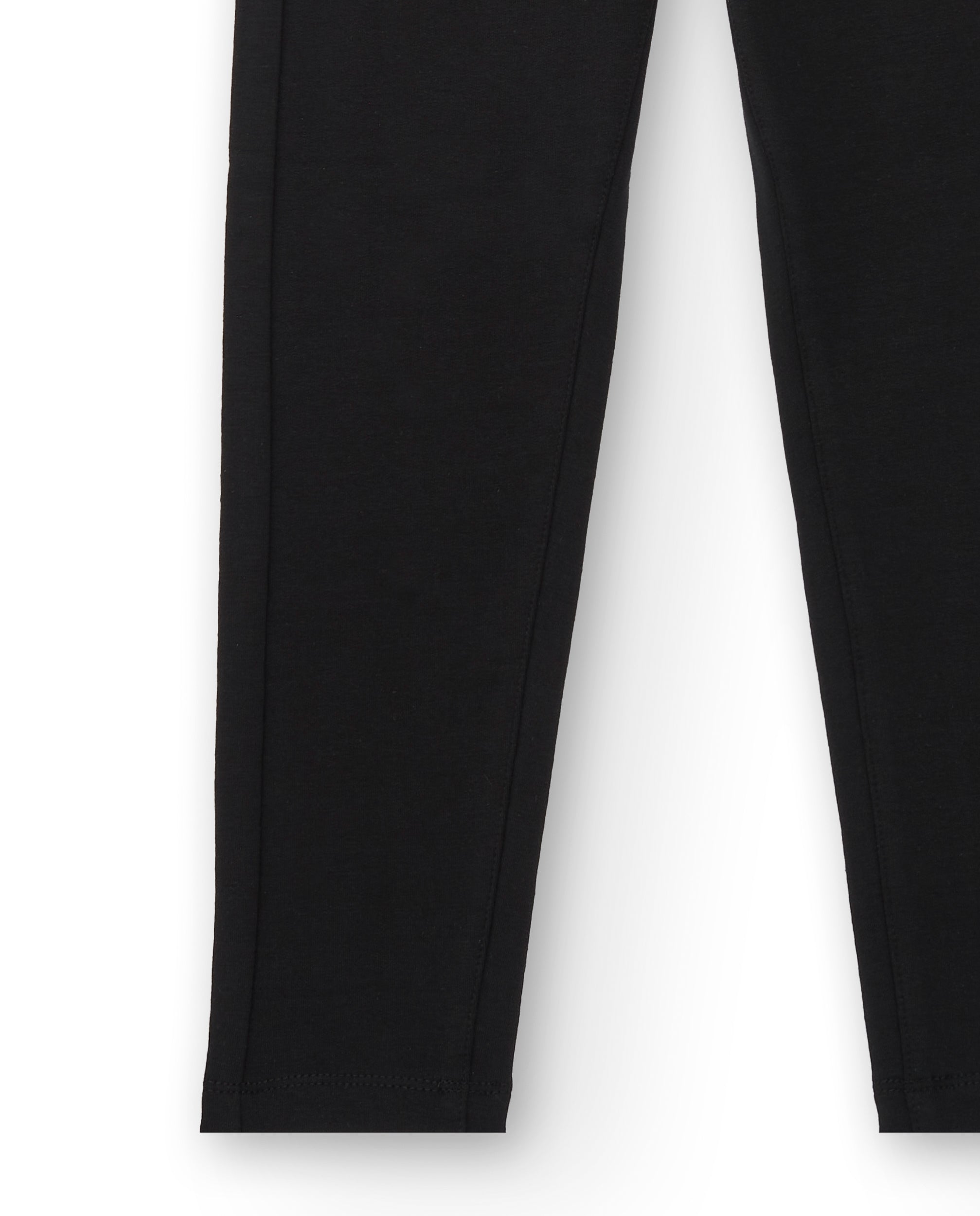 Leggings niña en negro con detalles de bolsillos colección