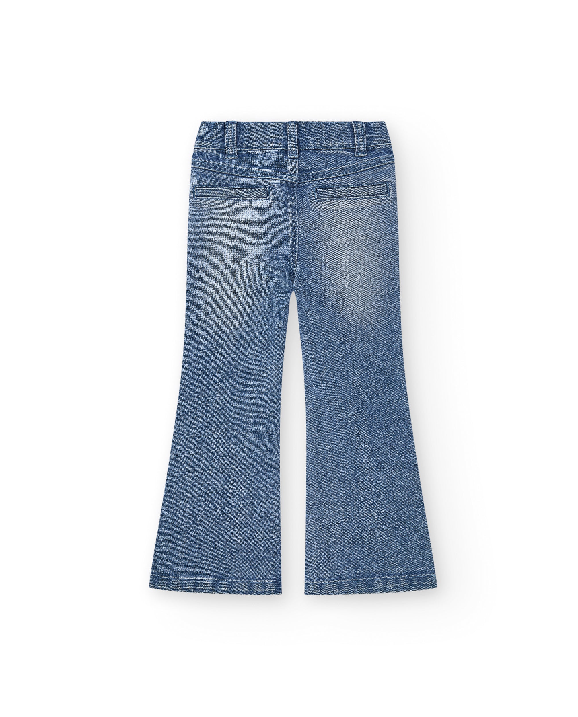 Pantalón vaquero niña en azul con detalle de apliques metálicos