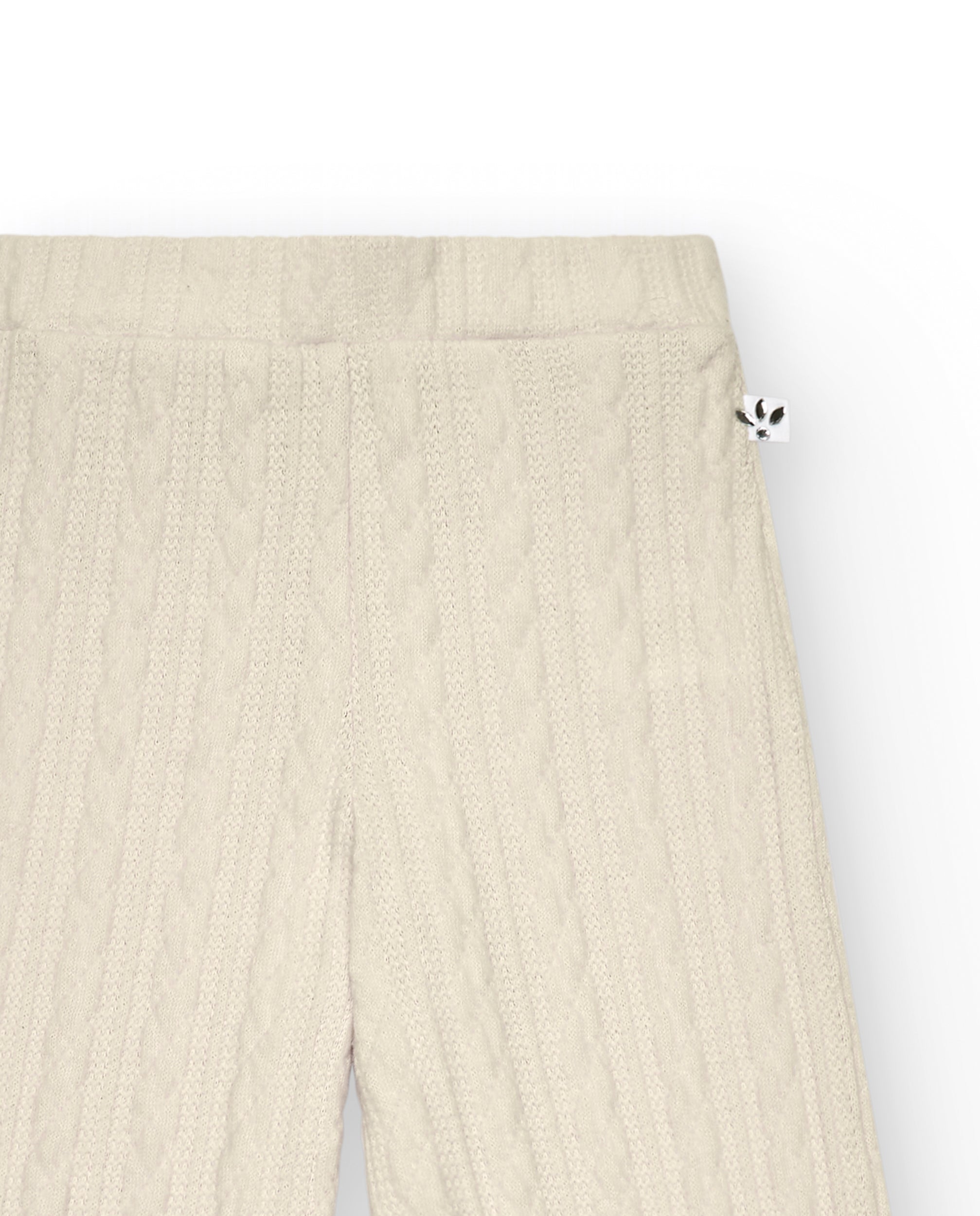 Pantalón acampanado niña en color beige con textura trenzada
