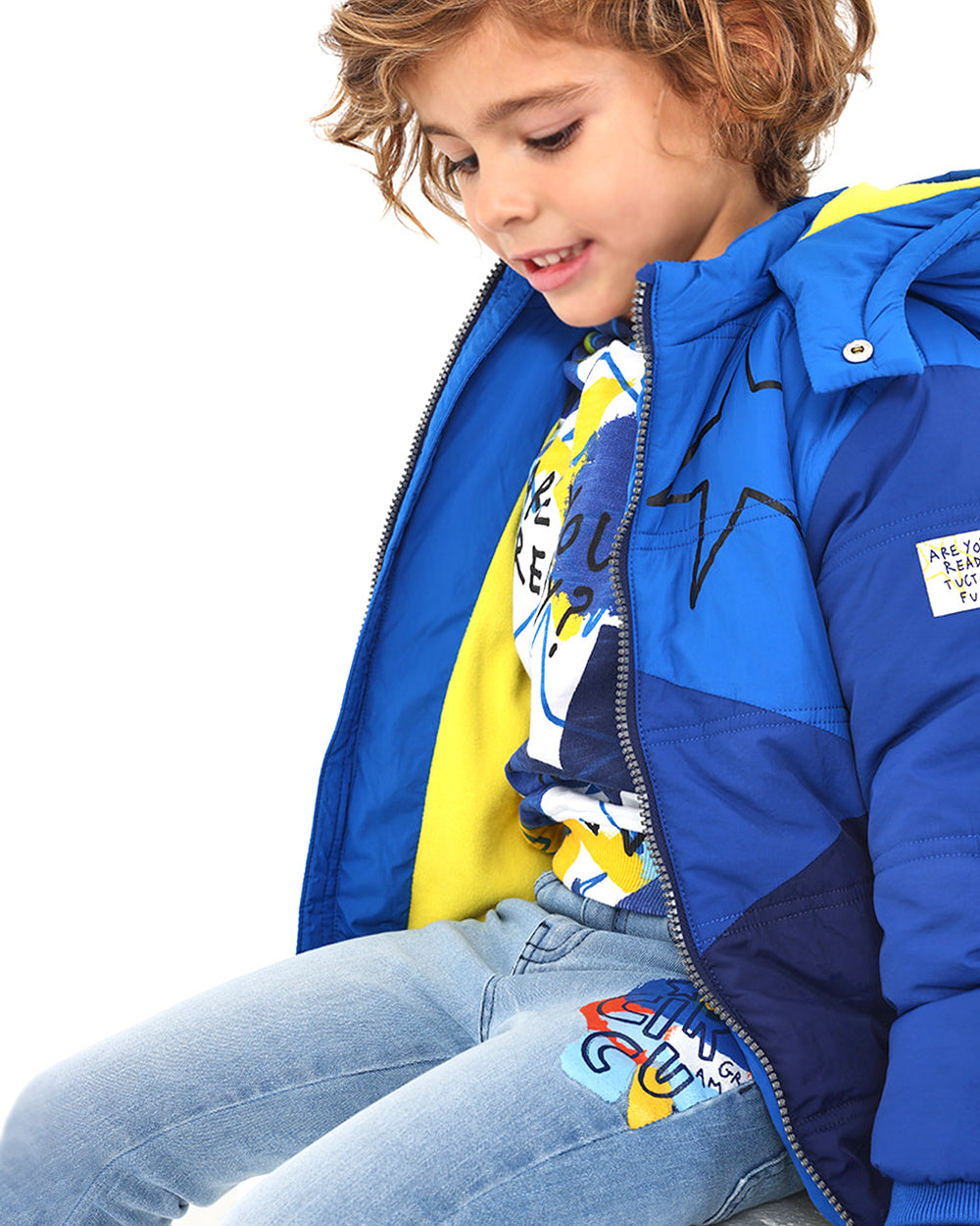 Parka técnica acolchada niño en azul con estrella estampada