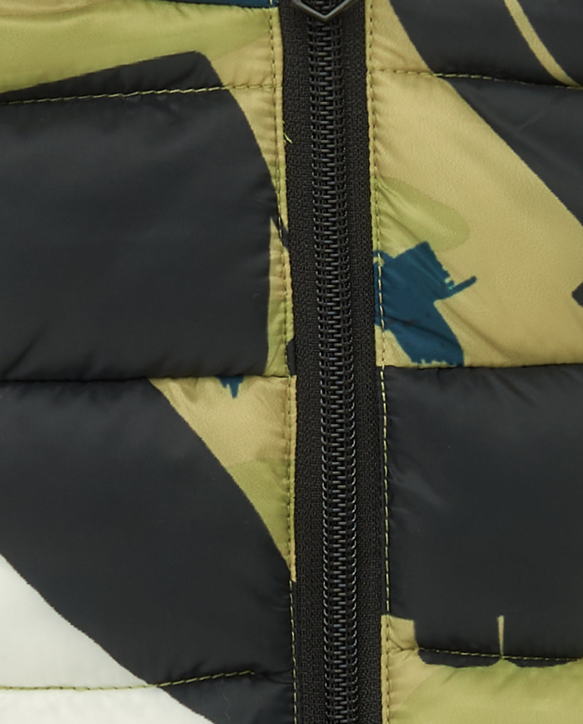 Chaqueta acolchada verde para niño con estampado de dinosaurios