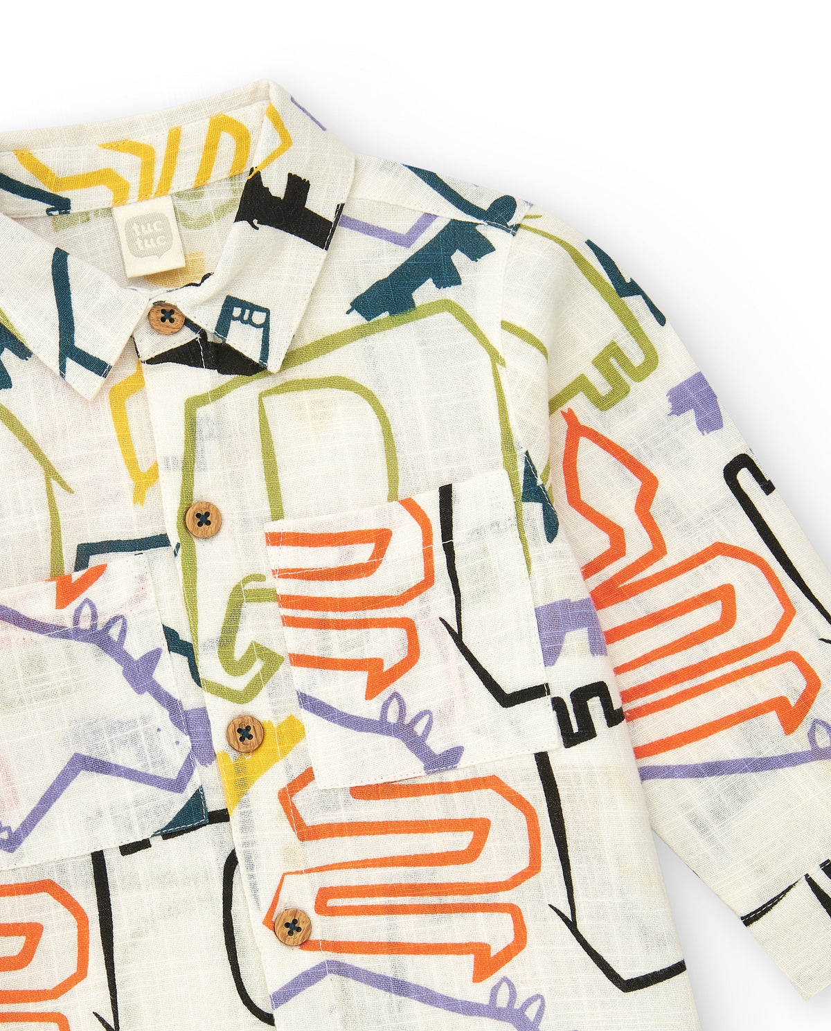 Camisa blanca para niño con estampado multicolor de dinosaurios