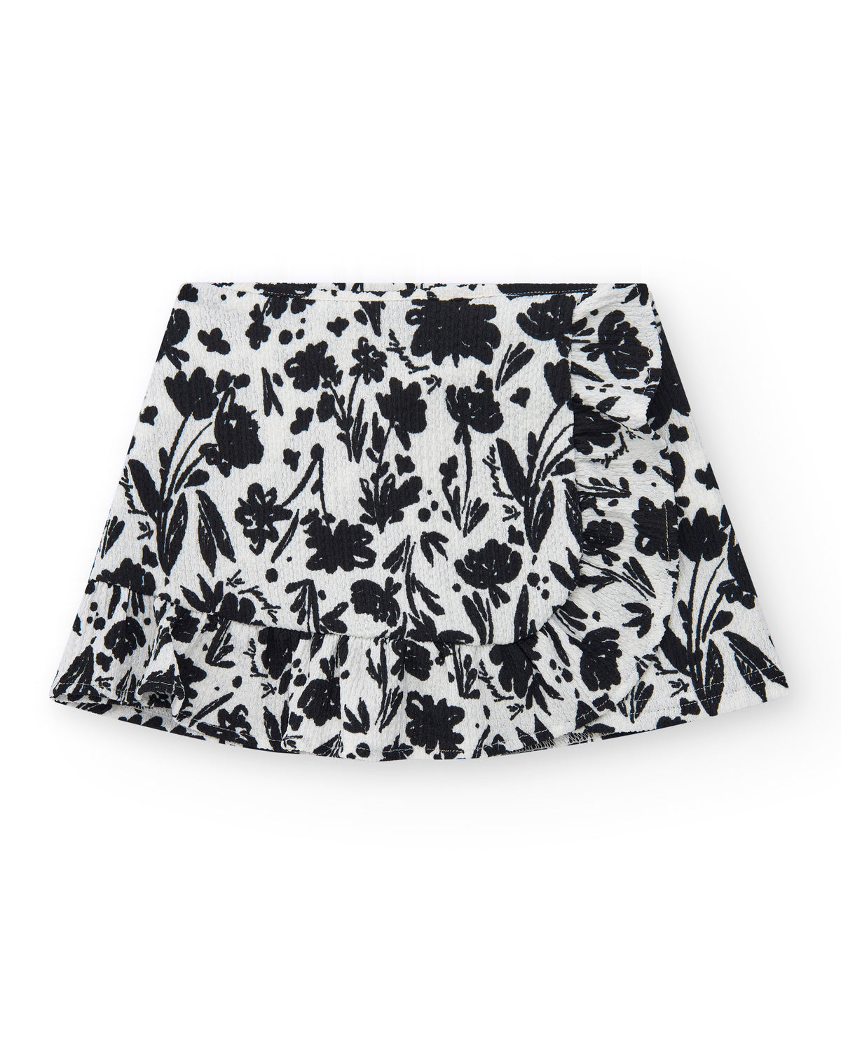 Falda para niña en blanco con estampado floral y volante