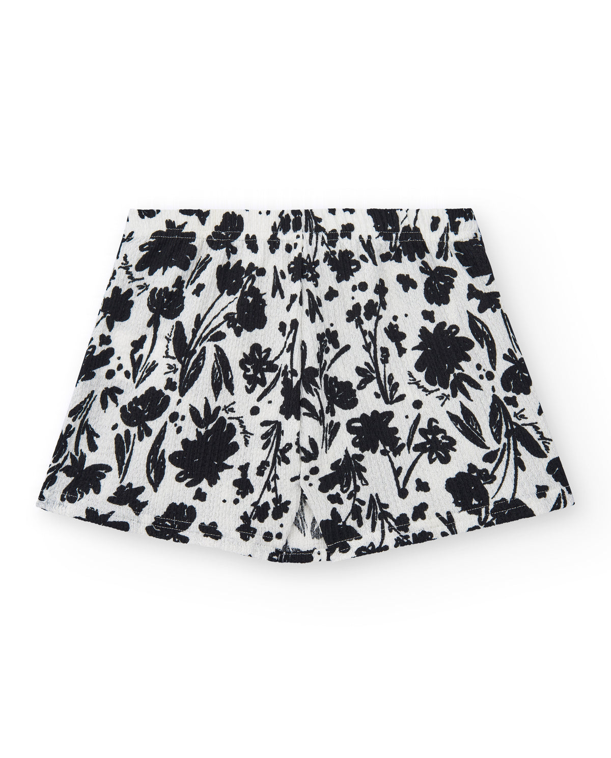 Falda para niña en blanco con estampado floral y volante