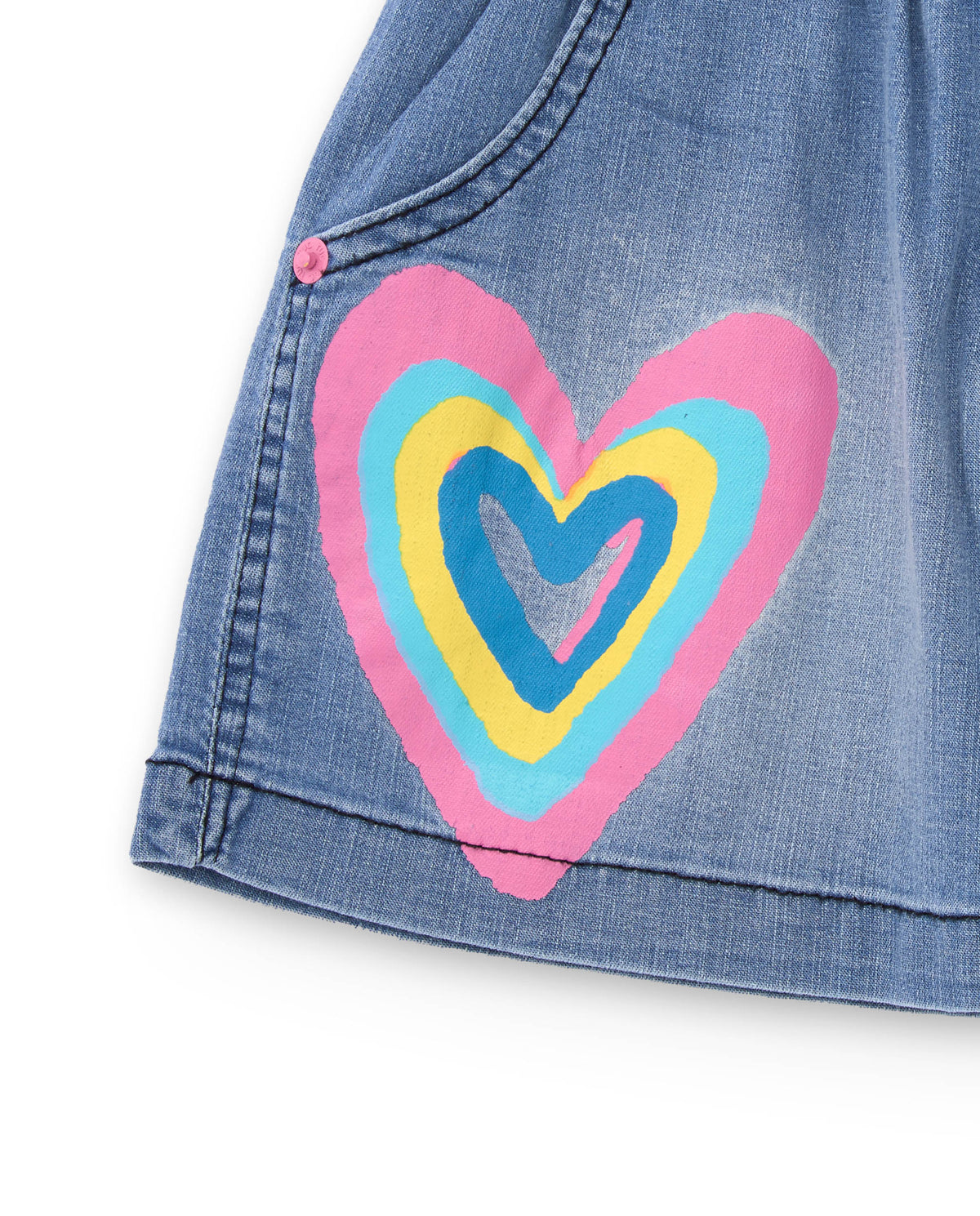 Falda vaquera para niña en azul con estampado de corazón