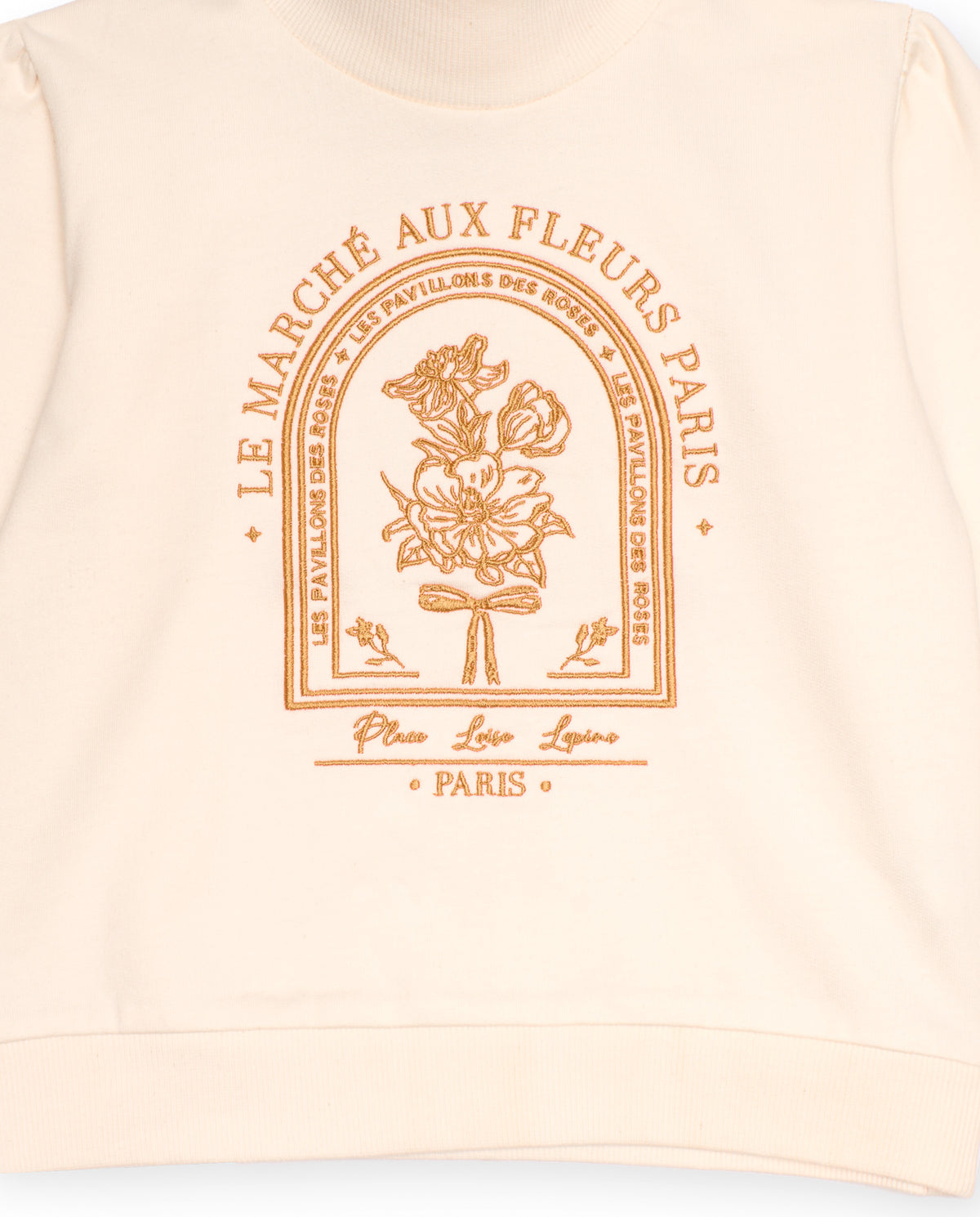 Sudadera color marfil para niña con cuello alto y estampado