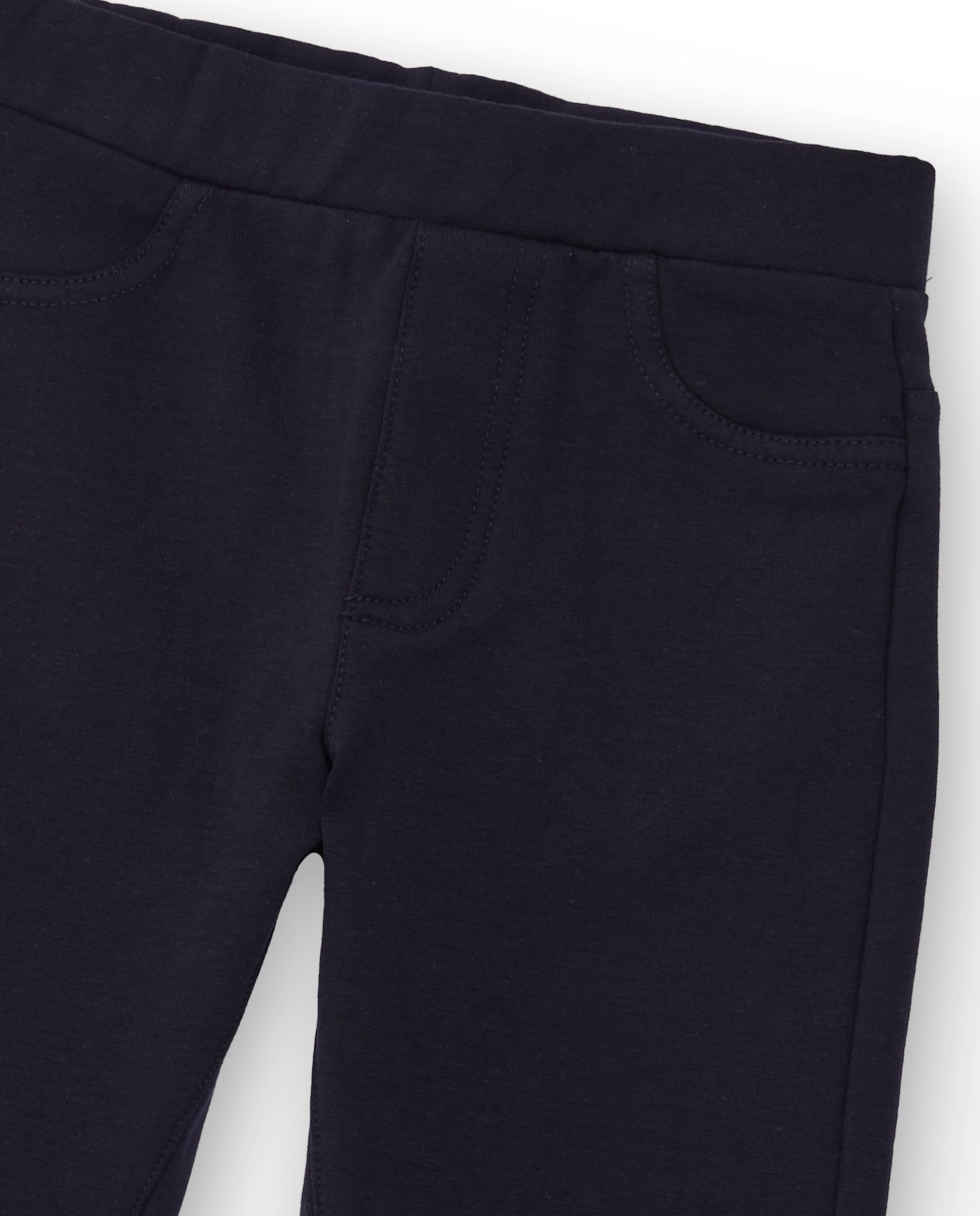 Jegging para niña en azul marino con bolsillos traseros