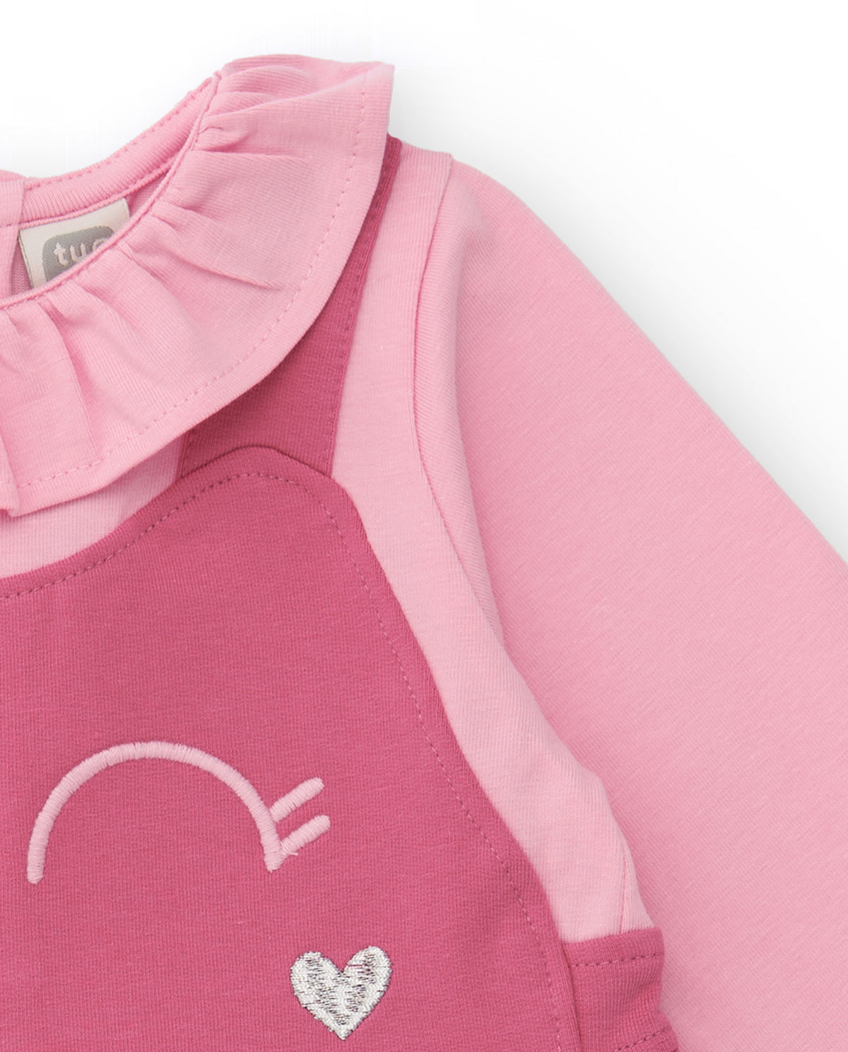 Vestido para recién nacido en tonos rosa con estampado de carita