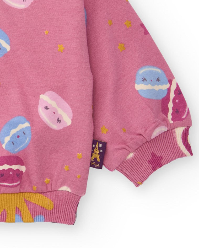 Conjunto para niña de sudadera estampada y pantalón rosa.
