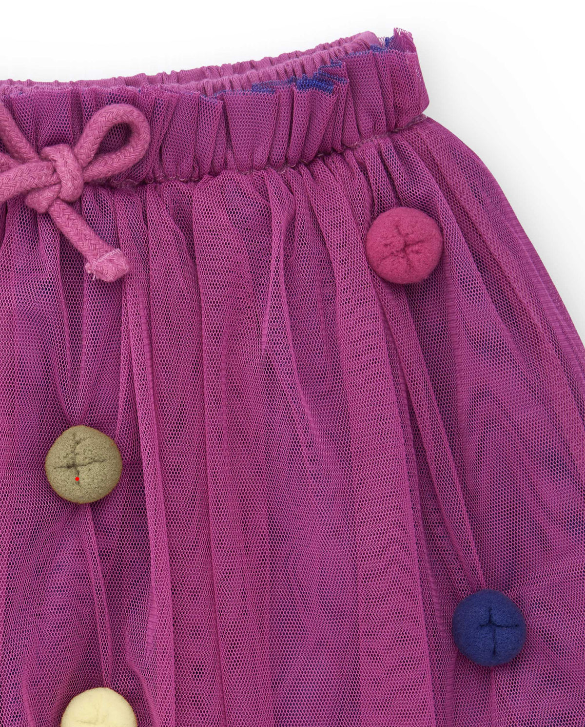 Falda de tul para niña en color fucsia con apliques de botones
