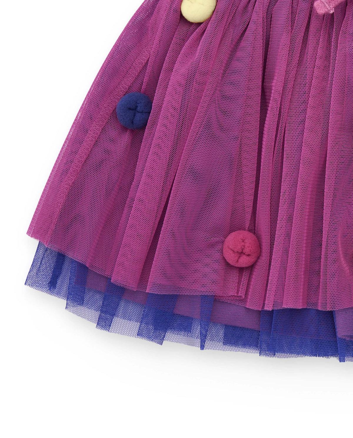 Falda de tul para niña en color fucsia con apliques de botones
