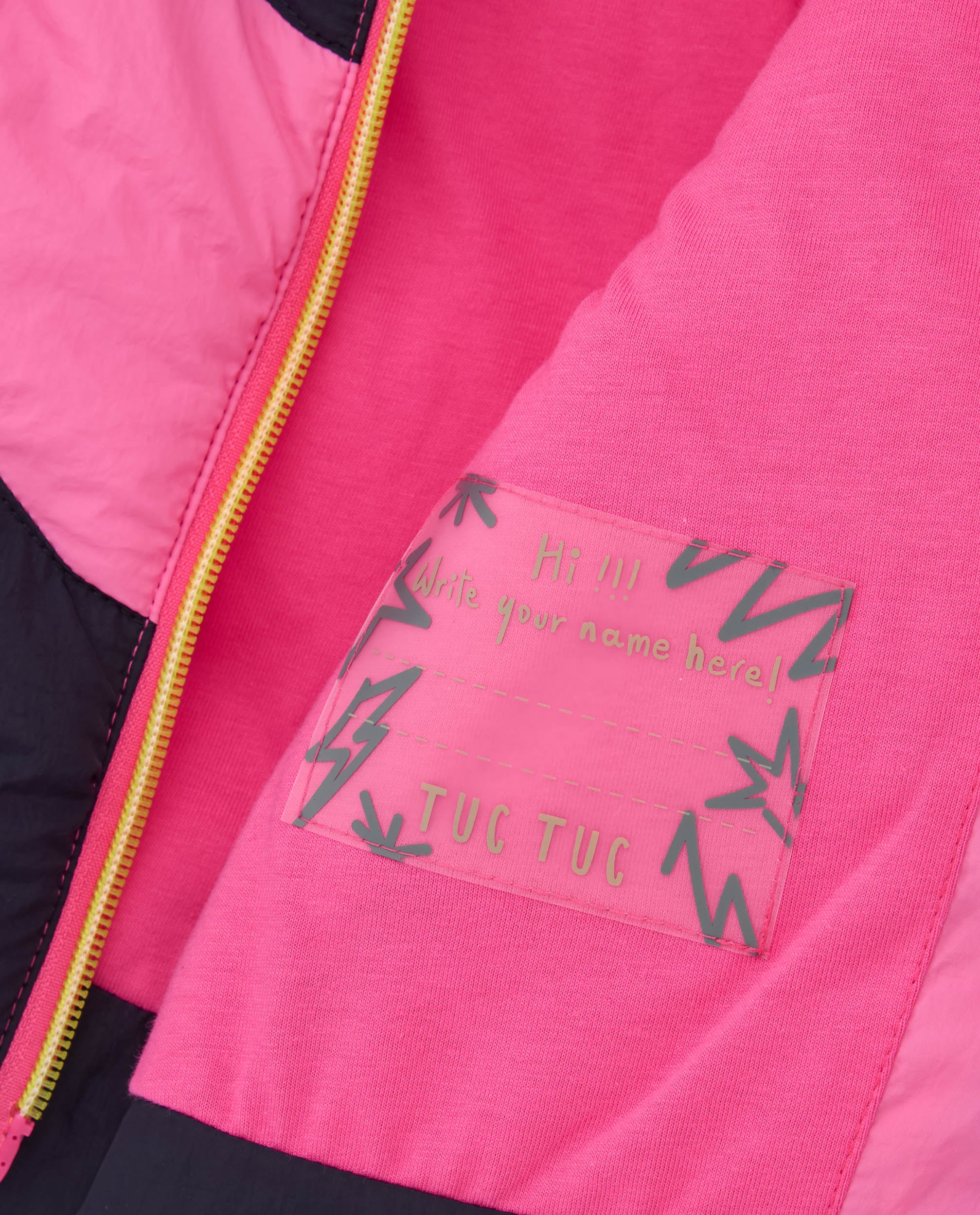 Chaqueta acolchada de niña en tonos rosa y azul marino con