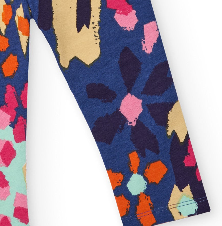 Leggings para niña con estampado de manchas multicolor.