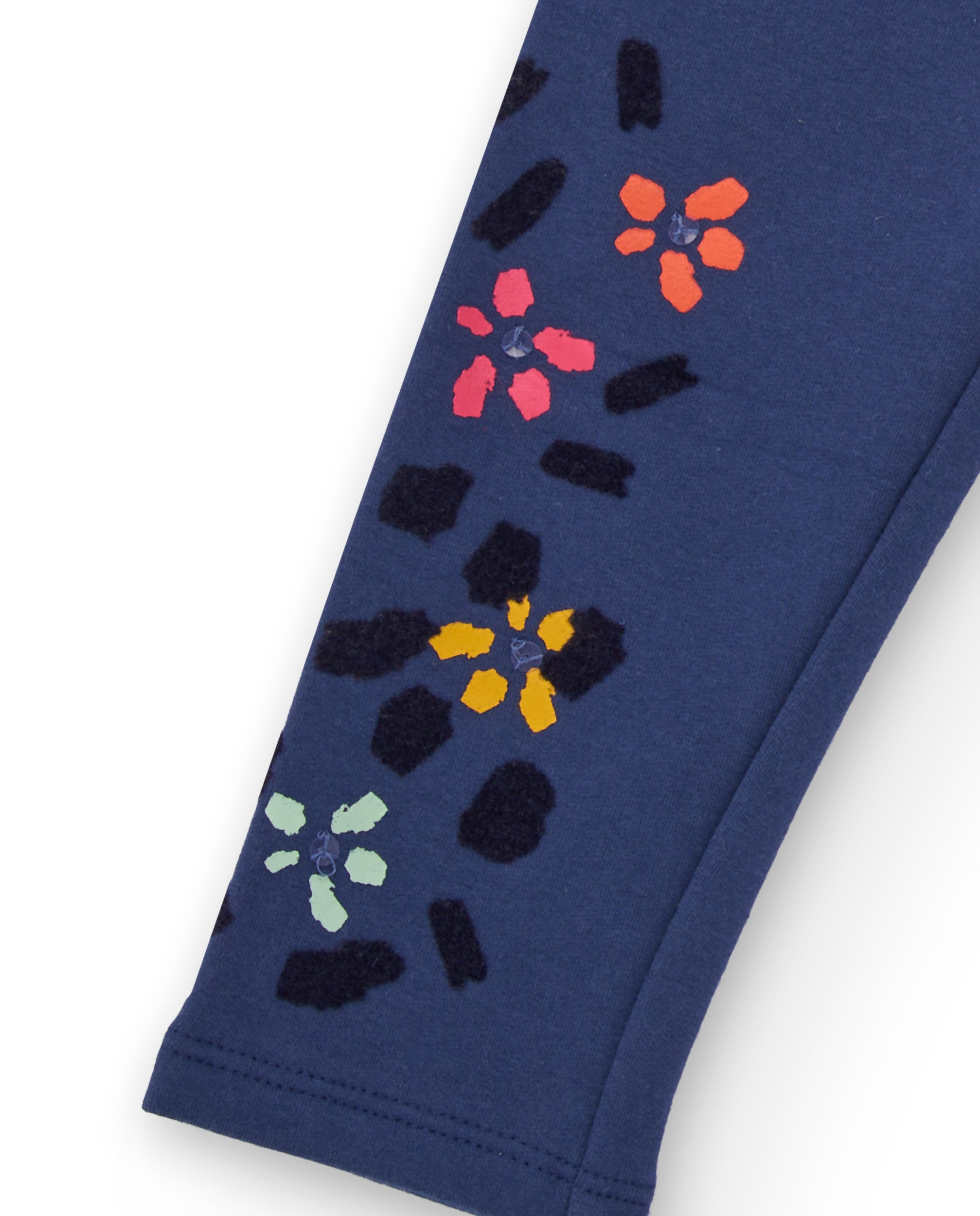 Leggings para niña en color azul marino con estampado de flores.