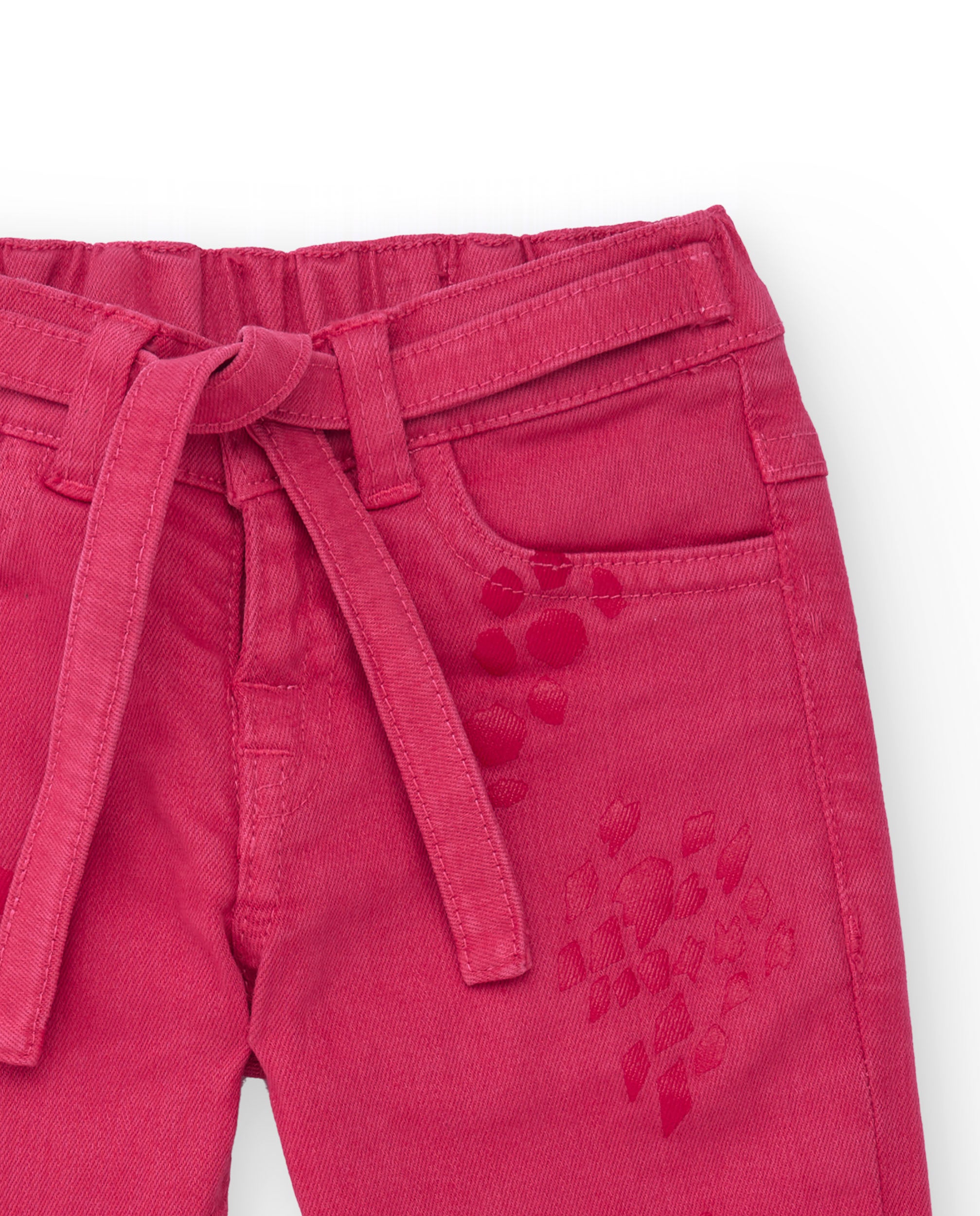 Pantalón para niña color fucsia con cinturón a juego.