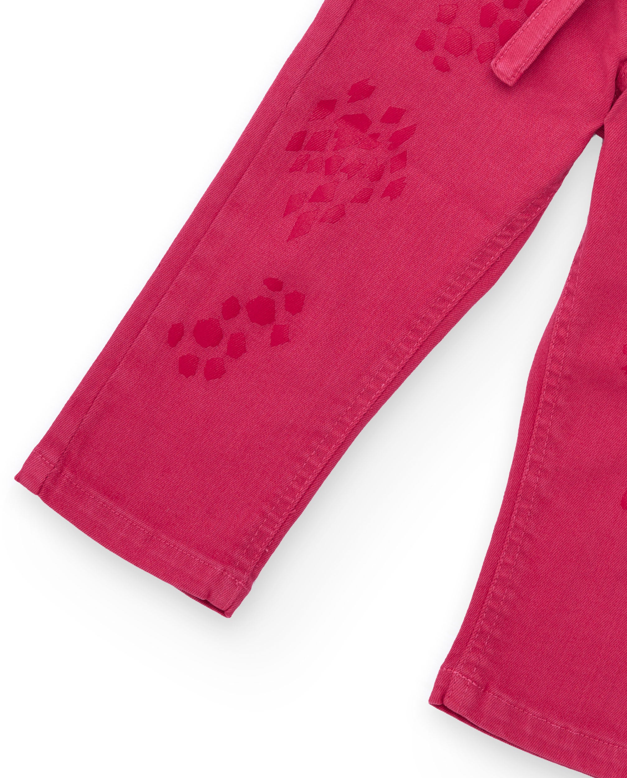 Pantalón para niña color fucsia con cinturón a juego.