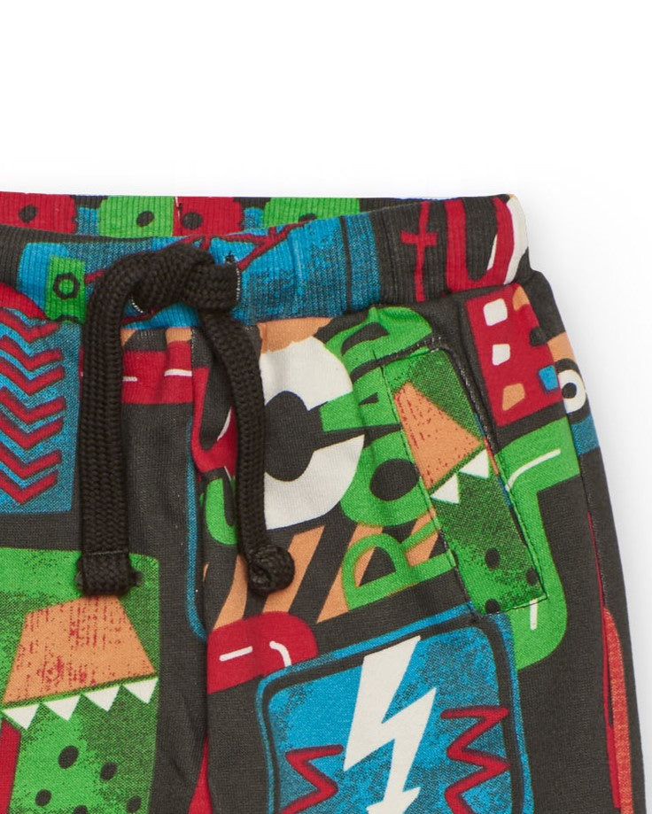 Pantalón para niño en marrón con estampado integral de vehículos