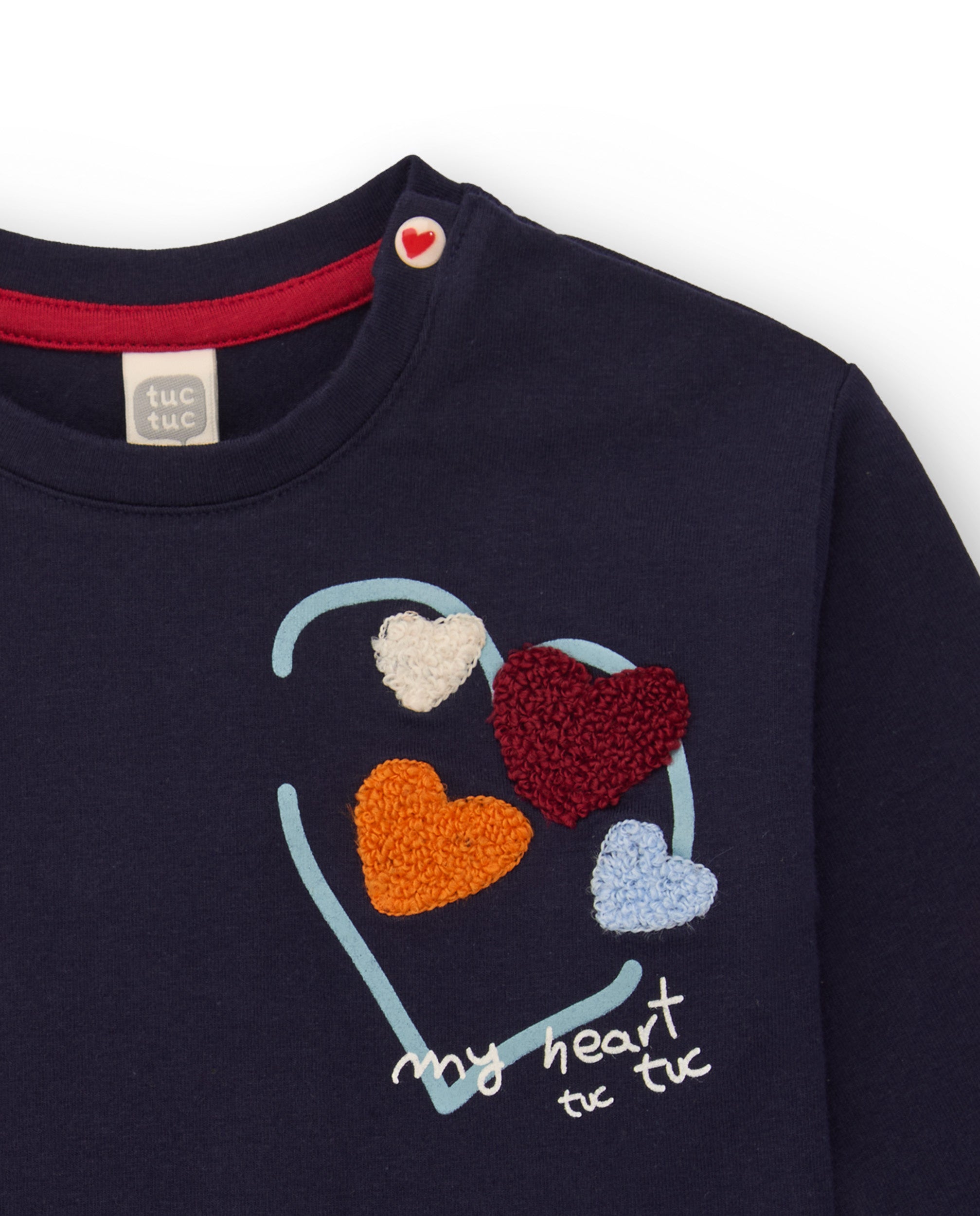 Camiseta para niña en azul marino con estampado de corazones en
