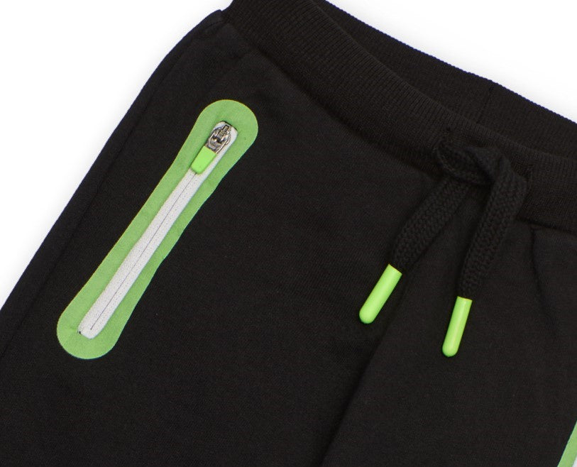 Pantalón jogger para niño en negro con cremalleras flúor